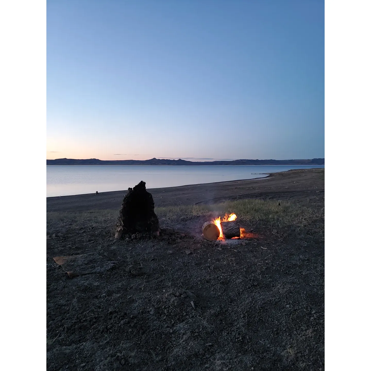 Discover the rugged charm and scenic beauty of Devils Creek Campground, a remote outdoor haven set against the stunning backdrop of the Missouri Breaks on the shores of the vast Fort Peck Reservoir. This idyllic retreat offers visitors a chance to escape the bustle of city life and immerse themselves in nature's grandeur.

Devils Creek Campground is a true adventurer's playground, where explorers arrive equipped for the great outdoors. For those with capable vehicles, such as a properly outfitted 4x4, the journey to the campground is an exciting prelude to the tranquility that awaits. The roads leading to Devils Creek Campground present a thrilling challenge for outdoor enthusiasts, featuring a range of conditions that highlight the untamed spirit of the area.

Upon arrival, guests are welcomed by the picturesque setting that the campground provides, complete with panoramic views of the surrounding landscape. This destination is perfect for visitors looking to engage with the natural environment, bask in serene vistas, and appreciate the unspoiled beauty of the reservoir and the adjacent lands. With its expansive skies and rich wildlife, the campground is a photographer's dream and a nature lover's delight.

Travelers embarking on their journey to Devils Creek Campground are encouraged to plan their trips during favorable weather conditions to ensure a safe and enjoyable experience. Explore the possibilities of boating, fishing, and hiking, or simply relax and savor the peace and quiet that this secluded spot offers. While the boat landing may require attention at times, the rewards of tranquility and natural allure are abundant for those who venture here.

A treasured destination for many, Devils Creek Campground remains a cherished getaway year after year. So whether you're seeking a solitary retreat or an exciting outdoor adventure, this remarkable enclave provides the perfect backdrop to create lasting memories amidst the grandeur of Montana's landscapes. Description by ChatGPT.