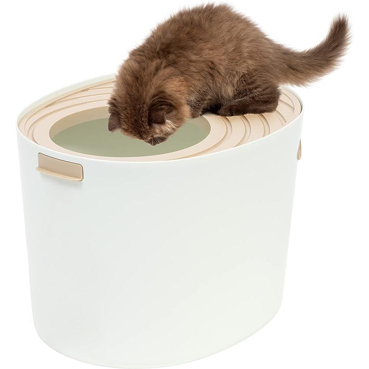 The IRIS USA Medium Stylish Round Top Entry Cat Litter Box is a sleek and modern option for cat owners looking for a convenient and stylish litter solution. This litter box features a round top entry design, making it easy for cats to enter and exit while providing them with privacy.