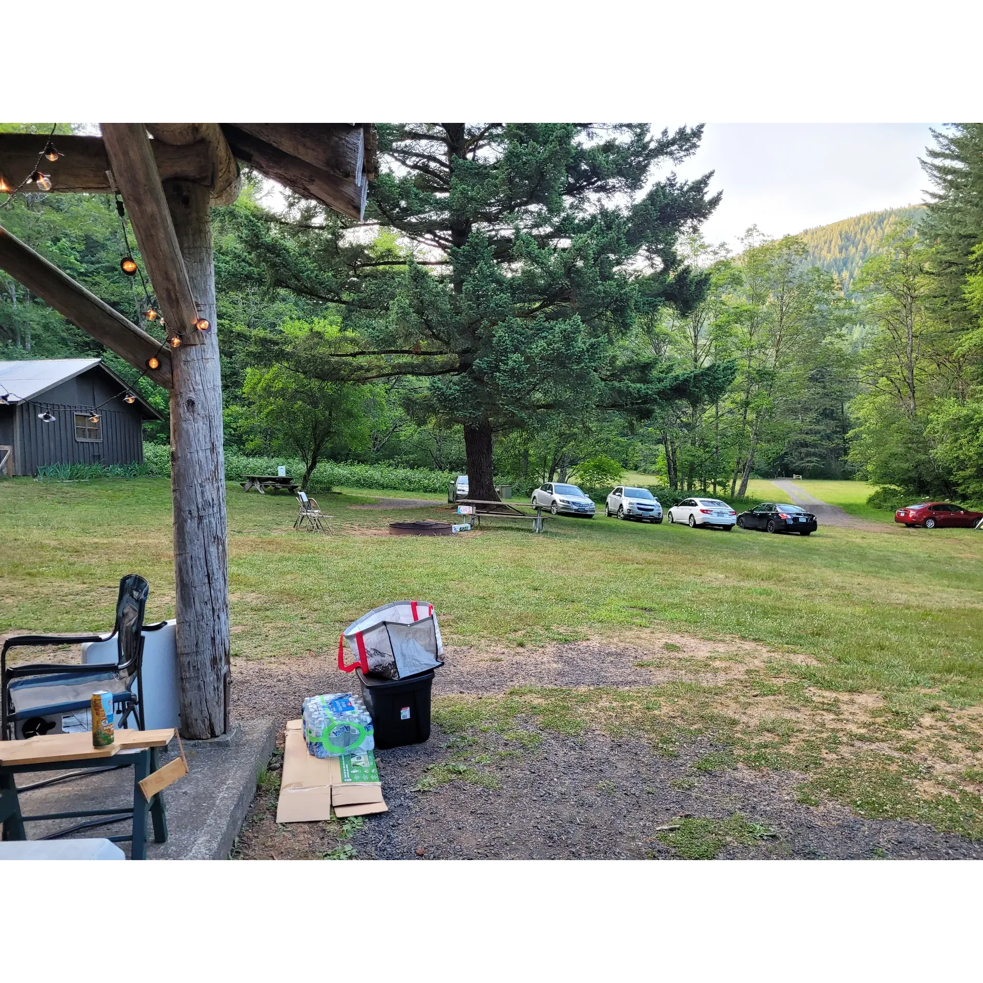 Beacon Rock State Park Group Campsite offers an exceptional outdoor experience for groups looking for the ideal mix of adventure and socialization. With its vast capacity to accommodate numerous guests, the campsite becomes an excellent choice for large gatherings of families, friends, and organizations seeking to forge bonds amidst the splendor of nature.

Visitors are often impressed by the congeniality and helpfulness of the park staff, ensuring a smooth and pleasant stay for everyone. The site prides itself on providing conveniences that are not always commonplace in wilderness settings, such as accessible water and electricity supply, which are thoughtfully integrated into the environment for a comfortable camping experience. Groups visiting the campsite are encouraged to bring along a hose and an extension cord to maximize the provided amenities.

Surrounded by the picturesque beauty of the park's lush valley, the group campsite serves as a gateway to a variety of trails, inviting guests to explore the breathtaking landscapes that envelope the area. Additionally, the proximity to river access points allows for an easy transition from land to water-based activities, making every day a new adventure.

For those seeking a simplified overnight option, the campsite boasts an open bunkhouse where adventurers can unroll their sleeping bags on a platform, becoming one with the park's serene night atmosphere animated by the calls of owls and the subtle presence of local wildlife.

Whether you're planning a grand outdoor celebration or embarking on a thrilling group hike, this group campsite provides a spacious open field ideally suited for communal activities and cozy gatherings around two inviting fire pits. The campsite's charming yet rustic setting is in harmony with the natural landscape, promising a memorable and authentic outdoor experience. Description by ChatGPT.