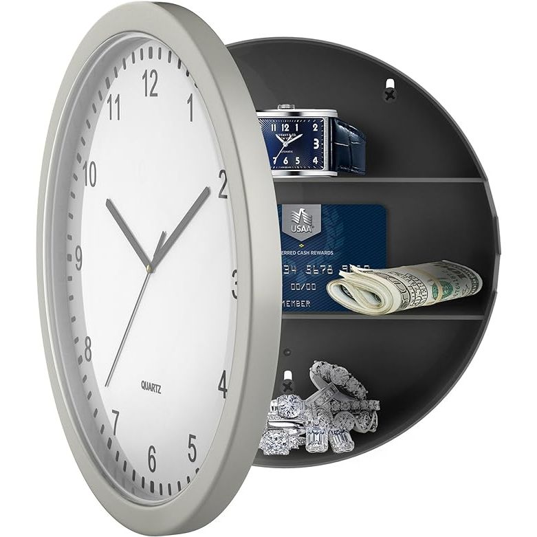 The Stalwart Wall Clock Safe is a 10-inch battery-operated analog timepiece with a hidden shelf storage component for secret compartment items. The clock features a sleek silver and white design that blends seamlessly into any room decor.