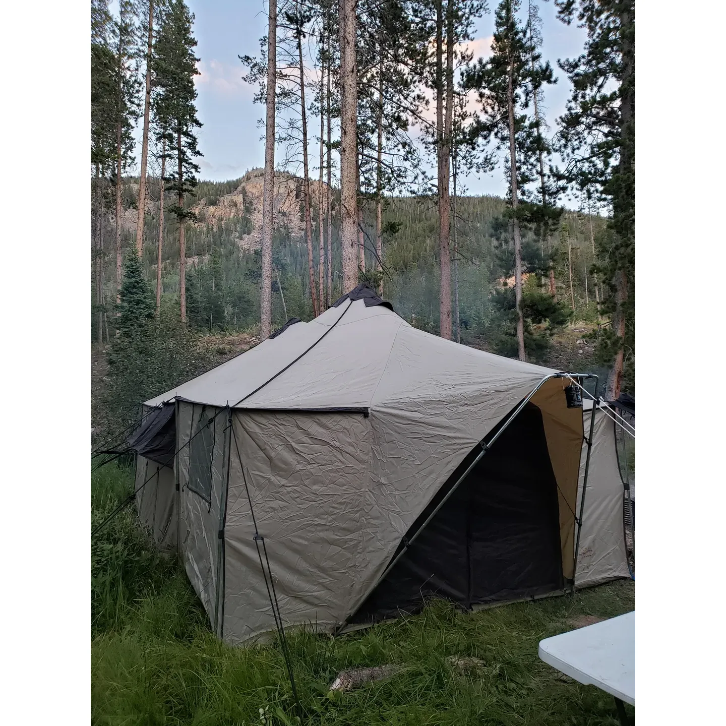 Tunnel Campground offers an idyllic outdoor experience for travelers seeking the timeless allure of Colorado camping. It has become a much-loved destination among those traveling the scenic byways on motorcycle trips or those looking to immerse themselves in the tranquility of nature. Offering a selection of pristine sites, including the well-liked site #6, the campground is known for embodying the quintessential Colorado wilderness charm.

Visitors often remark on the peace and quiet that envelops the area, allowing for a genuine reprieve from the hustle and bustle of daily life. The meticulously maintained grounds add to the appeal, with the commendable cleanliness extending to the well-appointed bathroom facilities. One compelling feature of Tunnel Campground is the remarkable state of its access routes; the 6.4 miles of dirt road leading to the campground is frequently described as well-kept, ensuring a smooth journey to your serene retreat.

Positioned favorably amid the stunning Rocky Mountain backdrop, Tunnel Campground provides an oasis for outdoor enthusiasts. It is a favored base camp for hikers and adventurers eager to explore the towering Rawah Wilderness and the picturesque Poudre River Canyon. The nearby West Branch Trail, with direct access from the campground, encourages hikers to venture into the wilds, promising unforgettable journeys just footsteps away from their campsites.

The campground's appeal is magnified by the dedicated resident hosts who manage the grounds with notable care, contributing to an environment that families and friends cherish throughout the summer. Whether it’s a retreat for solitude or a group gathering, the arrangement of camping pads is ideal for easy socialization among neighboring sites.

While Tunnel Campground operates on a first-come, first-served basis without the need for reservations, its reputation for excellence attracts a steady flow of visitors, especially on weekends and during the summer season, prompting savvy campers to arrive early or opt for mid-week stays to secure their spot.

Ensuring an overall delightful camping experience, the resourceful site host is known for being helpful and accommodating to guests, providing guidance to ensure everyone can find a suitable spot for their needs. It's the combination of breathtaking scenery, outstanding management, and the welcoming, family-friendly atmosphere that makes Tunnel Campground a cherished destination for many and a place where treasured memories are made in the heart of Colorado's great outdoors. Description by ChatGPT.