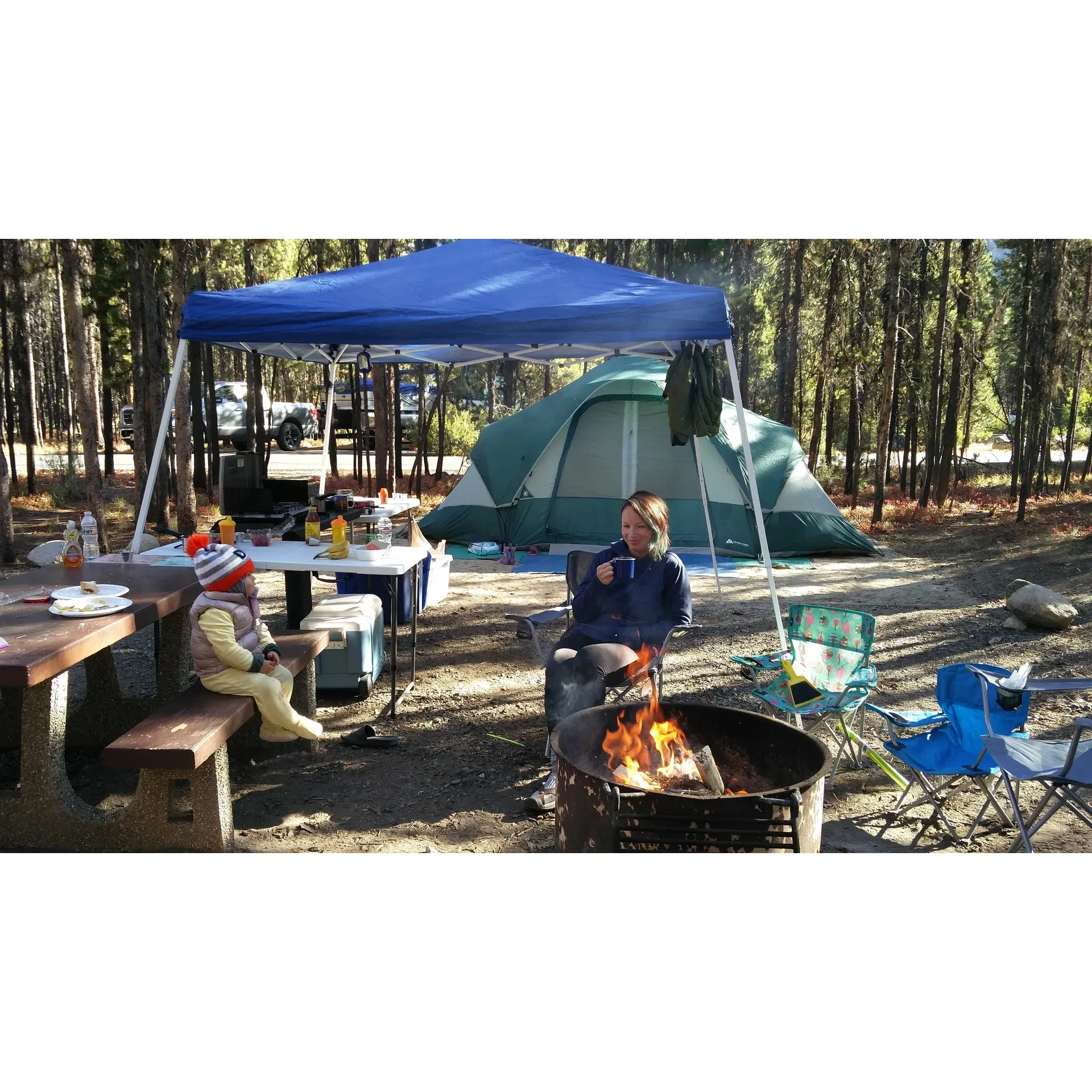 Shoreline Campground is a scenic outdoor retreat offering an idyllic setting for campers and adventure seekers alike. Located in the picturesque scenery of Warm Lake, Idaho, the campground is an oasis for those wishing to immerse themselves in the beauty of the great outdoors. With smooth paved roads leading to spacious paved pull-outs, the campground provides hassle-free access to the perfect spot for tents or RVs.

Visitors to Shoreline Campground can expect a range of thoughtful amenities designed to enhance their camping experience. Set within a landscape that boasts spectacular lake views, the campground’s well-defined sites offer each guest their own slice of wilderness, complete with fire pits, picnic tables, and grills for a classic camping experience enlivened by the taste of open-air cooked meals.

The campground's proximity to Warm Lake means that water activities such as fishing, swimming, and kayaking are just a stone's throw away. Anglers will appreciate the clear and pristine waters teeming with fish, while kayakers glide along the lake's tranquil surface. Those who prefer a land-based exploration will find the surrounding mountains present extensive trails perfect for hiking and mountain biking amidst breathtaking natural vistas.

Cleanliness and comfort are cornerstones of the Shoreline Campground, with well-maintained restrooms strategically placed for convenience, providing a refreshingly simple approach to camping. Aside from the essential services, campers continuously remark on the exceptional recreational opportunities, from serene mornings by the lake to wildlife sightings that elevate the sense of connection with nature.

The camp hosts at Shoreline Campground are known for their warm hospitality, ensuring that every visitor's stay is memorable and enjoyable. Though the campground’s allure ensures its popularity, especially on weekends, those planning ahead can secure a serene spot to unwind and soak in the tranquil atmosphere.

Culinary delights await at the nearby Lodge, where camping is complemented with great service and mouthwatering meals at the café—perfect for those moments when one wishes to take a break from campfire cooking. From the refreshing waters of Warm Lake to the inviting embrace of well-kept facilities and the array of recreational gear available for rent, Shoreline Campground delivers a sublime retreat that speaks to the heart of every nature enthusiast. Description by ChatGPT.