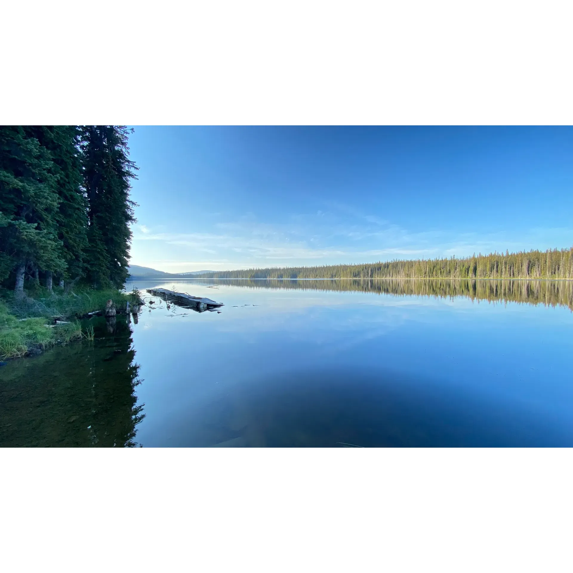 Discover an outdoor enthusiast's retreat at Bolean Lake Recreation Site—a serene getaway offering a quintessential backcountry camping experience. Accessible through an invigorating drive, adventurers are rewarded with a scenic journey along well-maintained gravel roads graced with the lush backdrop of British Columbia's forested wilderness.

Upon arrival, guests will find a cozy camping enclave equipped with several dirt pads, each accompanied by a picnic table providing the perfect setting for meals amidst nature. These designated areas present a charming space for setting up tents or parking small trailers, ensuring a comfortable stay surrounded by the soothing sounds of the wilderness.

Anglers and those seeking tranquility will delight in the absence of motorized boat noise, as there is no formal boat launch at the site. Instead, a nearby fishing resort at the eastern tip of the lake offers docks and additional camping facilities, where water enthusiasts can indulge in peaceful fishing expeditions or simply bask in the picturesque landscape.

First-time visitors and those returning will appreciate the clear signage directing the way to Bolean Lake. While the road is adventurous with switchbacks and rewarding views of the valley, the journey is part of the charm that leads to this hidden gem. Bolean Lake Recreation Site provides an idyllic destination for those looking to disconnect from the daily hustle and fully immerse in the natural beauty of the rugged outdoors. It's a place that fulfills the curiosity of those who have longed to explore it and leaves a lasting impression of tranquility and untouched wilderness beauty. Description by ChatGPT.