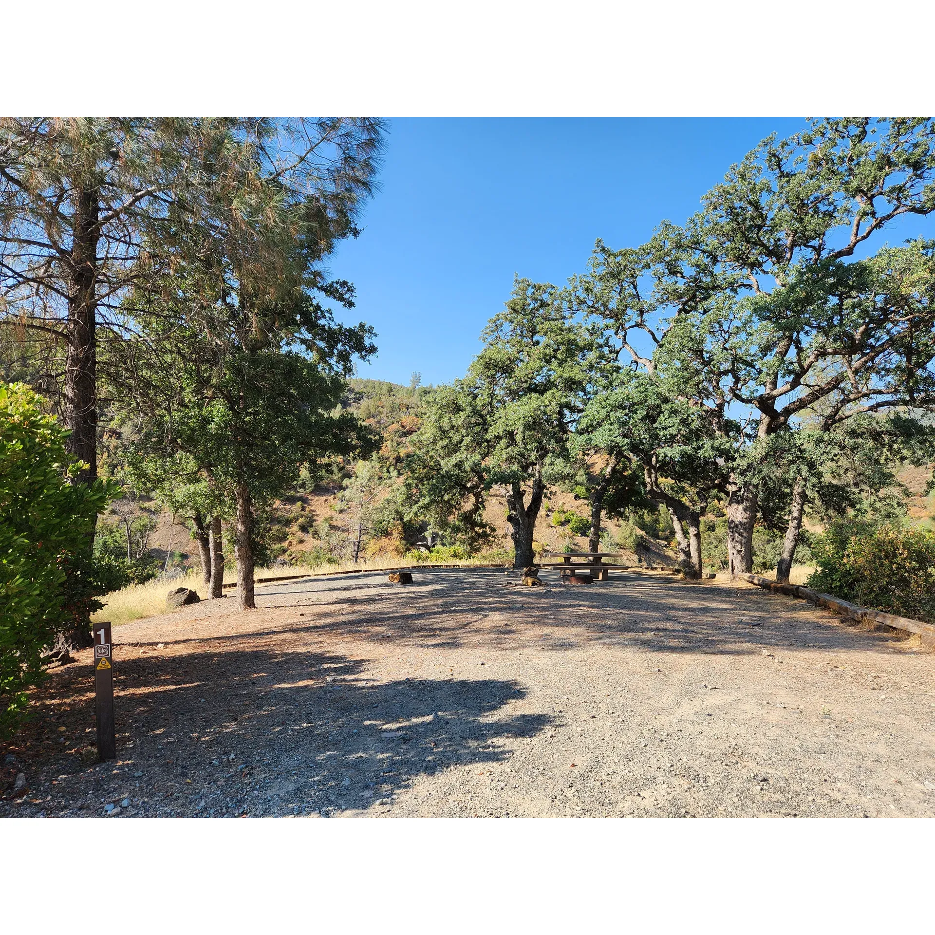 Escape to the tranquility of nature at North Fork Campground, your ideal outdoor retreat where simplicity and rustic charm provide an authentic camping experience. This picturesque campground offers a peaceful ambiance for those looking to disconnect and bask in the serenity of the wilderness. The primitive campsites, which feature only partial shade, perch elegantly along the edge of a stunning canyon, offering an immersive natural environment for your temporary abode.

Adventure seekers will revel in the campground's proximity to the clear, inviting waters of a beautiful stream, crowned by a delightful small swimming hole – an idyllic spot for cooling off on warm days. The swimming hole awaits just beyond a short trek down a steep trail, rewarding you with a refreshing dip and a sense of seclusion amidst the verdant surroundings.

Tent campers will find North Fork Campground particularly appealing due to the simplicity of the sites. Even those with a small trailer can find a spot before the grounds give way to the unspoiled landscape, ensuring a cozy corner in the wild for your stay. It's also a gateway for outdoor enthusiasts with OHVs, with nearby trails calling for daytime exploration.

The impeccably maintained vault toilet is a testament to the campground's commitment to cleanliness, ensuring a comfortable and environmentally responsible stay, even without the provision of running water. To preserve the pristine nature of this hideaway, campers are encouraged to come prepared and self-sufficient.

If you're looking to find solace away from the hustle of everyday life, North Fork Campground offers the seclusion and simplicity needed for a truly tranquil camping experience. Amid the gentle sounds of nature and under a canopy of stars, you'll discover the perfect getaway where you can rejuvenate and reconnect with the great outdoors. Description by ChatGPT.