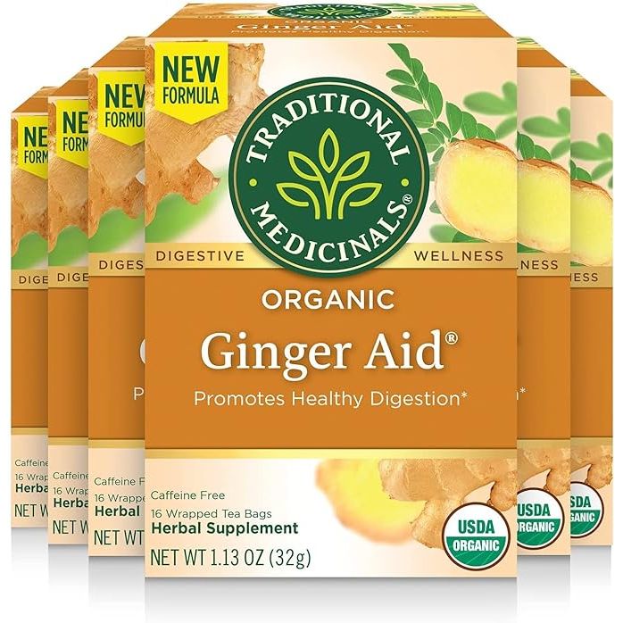 Traditional Medicinals Organic Ginger Aid Herbal Tea is a pack of 6 boxes, each containing 16 tea bags, for a total of 96 tea bags. This tea is specially formulated to help relieve digestive upset, indigestion, and nausea, making it a soothing and natural remedy for stomach discomfort.