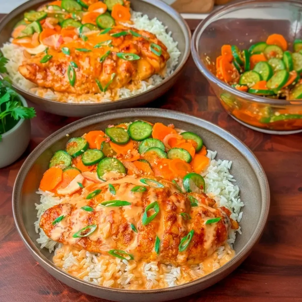 A delightful fusion of Asian-inspired flavors that combines crispy oven-baked chicken with a fresh cucumber carrot salad, perfect for any occasion.