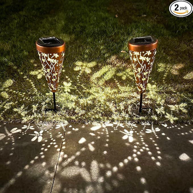 Light up your garden with the gorgeous and imaginative DIBIEECN Solar Garden Decor. With retro gold and copper exteriors and an irregular pattern inside, this solar lantern casts a bright, warm light with a Dragonfly pattern, making it the perfect choice for pathway decoration.