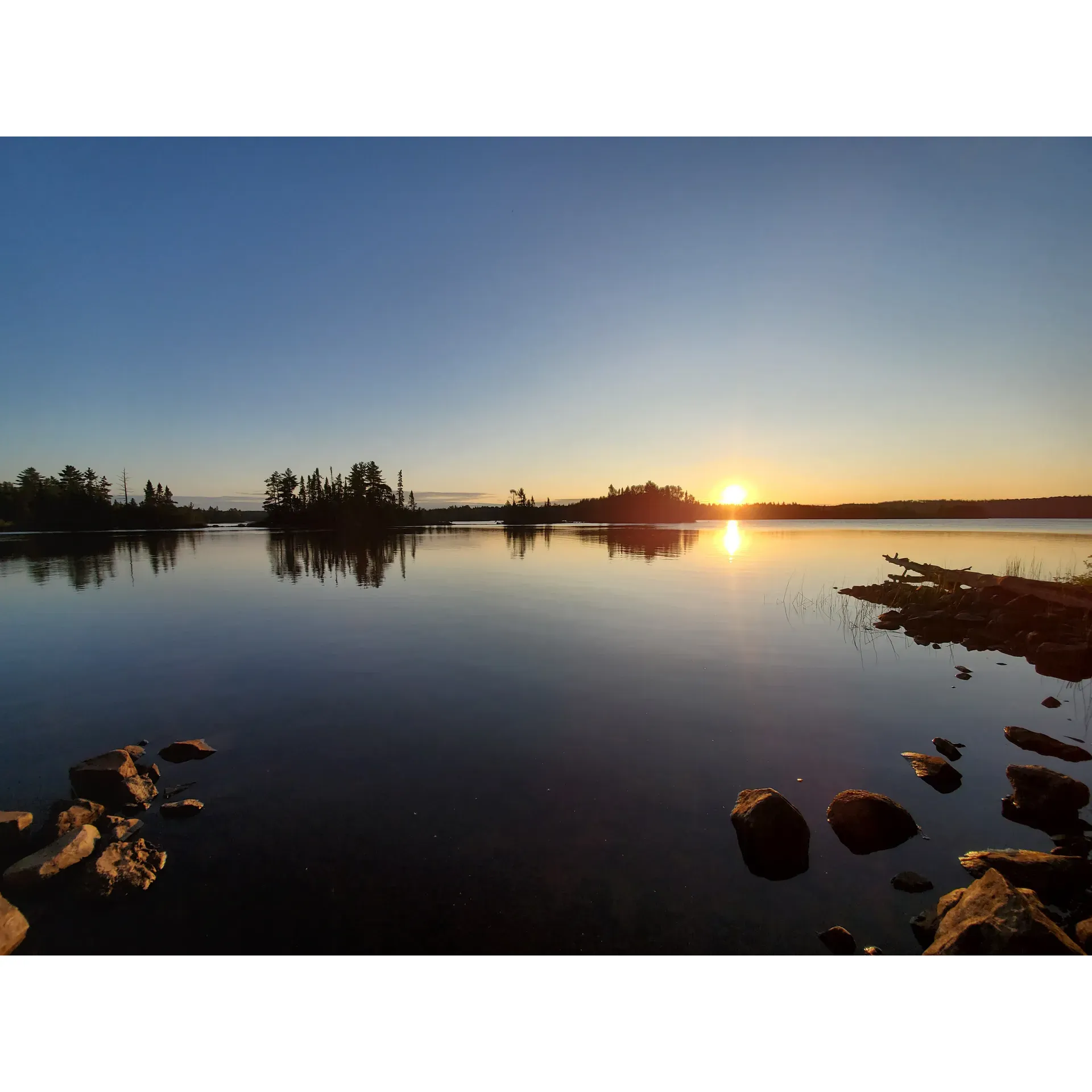 Crescent Lake Campground is a serene retreat within the expansive Superior National Forest, offering an array of picturesque campsites that cater to a variety of nature enthusiasts. Ample first-come, first-served sites are available even during peak weekends, providing opportunities for last-minute getaways to this tranquil lakeside haven.

Upon arrival, visitors are greeted by the shimmering waters and lush surroundings that make up the campground. Guests have praised the secluded yet accessible location, perfect for those seeking a peaceful respite. The campground's layout ensures privacy and spaciousness, with many sites enjoying direct access to the lake, accommodating both walk-up and drive-up preferences. Ideal for long weekends or stopover nights, the campground entices with its enchanting atmosphere and has been recognized as a place where one could gladly extend their stay to soak in the natural beauty.

Outdoor activities flourish here, with kayaking right from select campsites and unparalleled views that invite adventurers to immerse themselves in the great outdoors. The campground's pet-friendly policy ensures that your four-legged friends can join in on the fun, making for unforgettable family memories.

The amenities provided enhance the camping experience, with on-site firewood sales ensuring cozy nights under the stars and potable ATamp; new water supplies to maintain comfort during your stay. For those in search of convenience, essential services and additional supplies can be found at nearby outposts.

With its stunning lakeside sites, Crescent Lake Campground remains a cherished destination for campers yearning to escape the hustle and bustle of daily life and experience the unique serenity that only a wilderness retreat can offer. Description by ChatGPT.