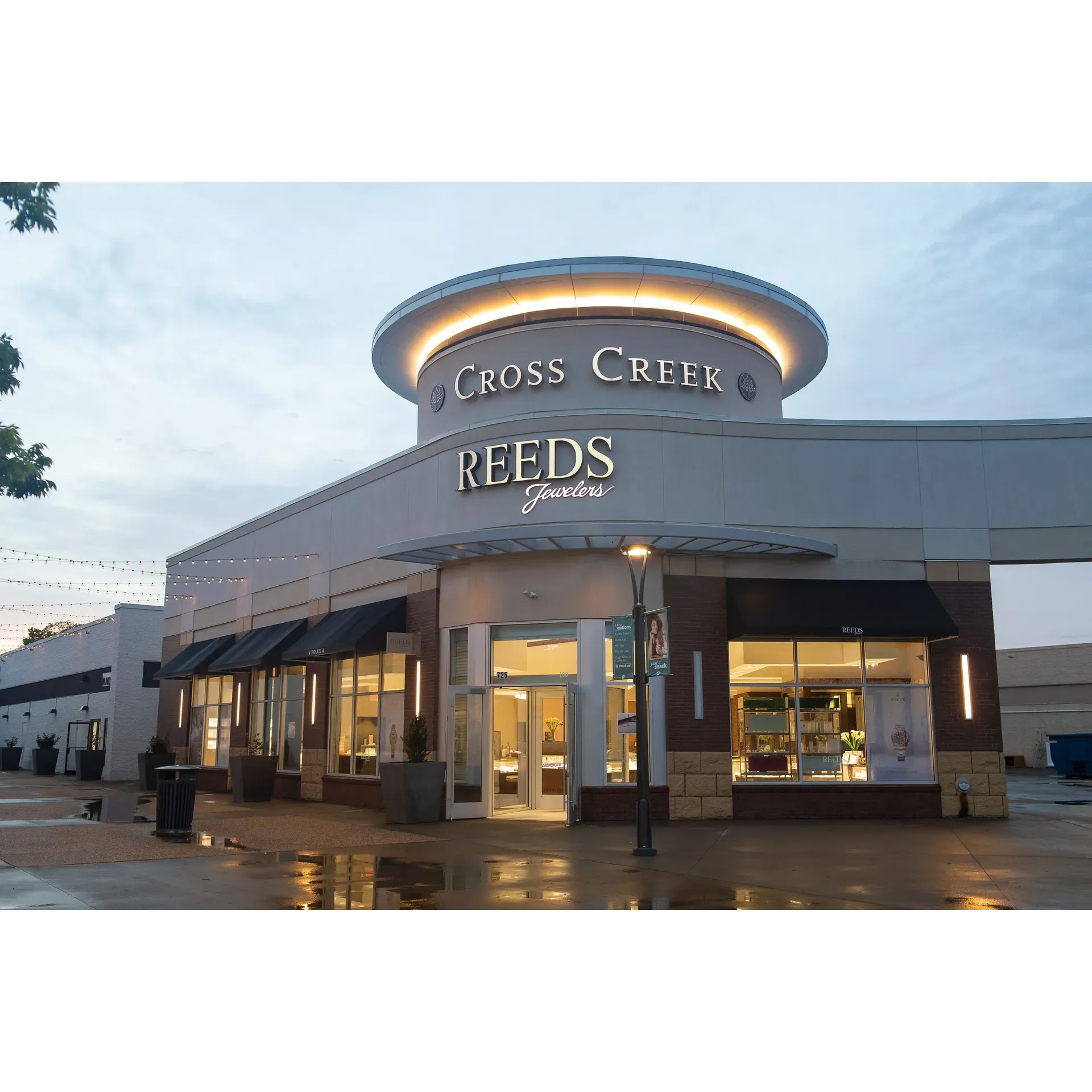 At REEDS Jewelers, customer satisfaction sparkles as brightly as their exquisite collection of fine jewelry. Clients flock to this esteemed establishment for their wide array of elegant wedding bands, timeless timepieces, and delightful gifts for all occasions, made all the more special by the warm and professional service that greets them.

The collaborative and caring environment fostered by the staff transforms the selection process into a joyous celebration, gently guiding couples to find the perfect representations of their love. Stories of memorable visits abound, with staff members being commended by name for their honest, friendly, and insightful contributions to these cherished moments.

A sense of trust and respect pervades the shopping experience at REEDS Jewelers. Expertise shines through in the specialized services offered, such as meticulous jewelry appraisals conducted with precision and speed—attributes that do not go unnoticed by those who entrust their precious heirlooms to REEDS.

People of all ages, even those as young as four months old, can discover their first piece of jewelry here, an item likely to be treasured for a lifetime, thanks to the attentive assistance provided by the dedicated team. The level of care and professionalism exhibited ensures that every encounter leaves a lasting impression.

Engagement ring seekers and wedding band hunters, rejoice; the journey towards "I do" often begins with the patient staff at REEDS Jewelers, whose expertise helps capture dreams in metal and stone. The commitment from team members like Cameron to provide patient and helpful service makes REEDS the chosen spot for return visits, be it for sizing inquiries that blossom into engagements, or the selection of bands for the big day.

REEDS Jewelers at Cross Creek is acclaimed for more than just its role in crafting the symbols of union; it stands as a testament to the joy and excitement that exceptional service, combined with high-caliber products, brings to every customer's special journey. Description by ChatGPT.