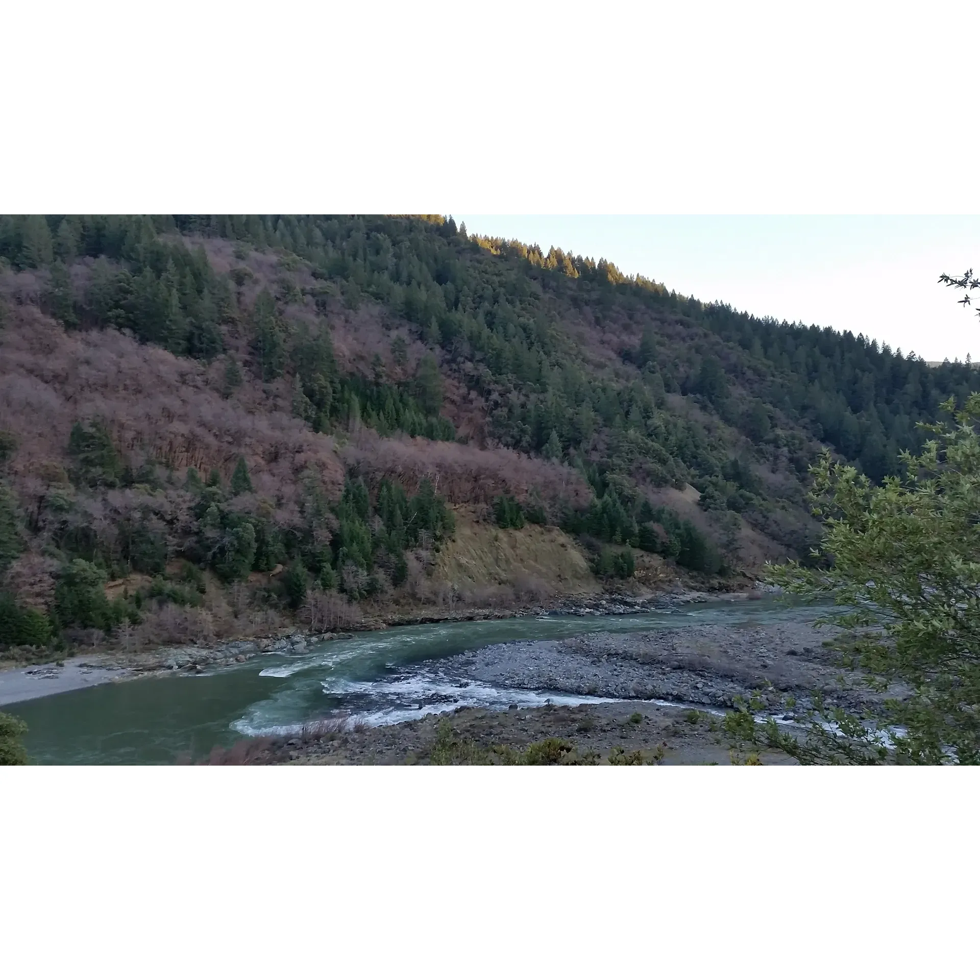 Bluff Creek Campground, a serene and rejuvenating destination under the auspices of the respected Yurok tribe, invites new and returning visitors to experience its enchanting grounds. With a rich historical backdrop, the campground has flourished into a picturesque retreat for outdoor enthusiasts and peace-seekers alike. 

Guests are welcomed by Ross, the commendable camp host, renowned for his exceptional hospitality, wealth of knowledge, and unwavering friendliness. Both Ross and his partner foster a warm and convivial atmosphere that resonates throughout the campground, ensuring every visitor's experience is memorable. 

This haven is the perfect spot for making lasting memories with friends and fellow adventurers. Amid the whispering trees and tranquil ambiance, some visitors playfully engage in the local legend, scanning the lush surroundings for the elusive Bigfoot—enhancing the sense of mystery and fun that Bluff Creek is known for.

Offering great value, the site is beautifully maintained, providing a cost-effective getaway without compromising on the richness of the cultural and natural environment. Long-time guests and newcomers alike commend Bluff Creek for its unspoiled beauty and peaceful environs, often describing it as a place of healing and tranquility.

Whether you are returning to soak in the familiar splendor or discovering Bluff Creek for the first time, this campground promises an experience that is both beautiful and steeped in the heritage of the Yurok tribe, awaiting all who seek a peaceful retreat into nature's embrace. Description by ChatGPT.