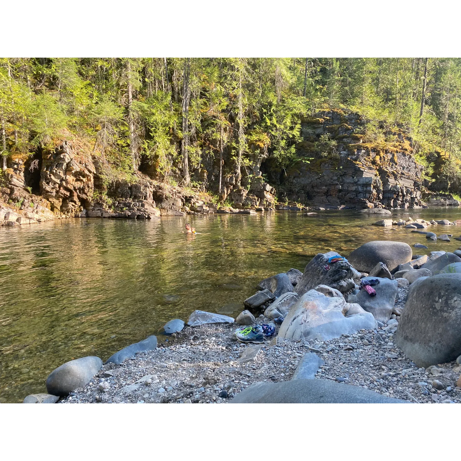 Yaak Falls Campground is a haven for outdoor enthusiasts and those seeking a reprieve from the hustle and bustle of daily life. Providing a delightful escape into nature, this campground offers well-maintained picnic tables at each site, creating a perfect setting for families and friends to gather and enjoy meals surrounded by the tranquil beauty of the outdoors. Revel in a serene atmosphere where the perpetual murmur of the Yaak River adds a calming backdrop to every activity.

The campground's prime feature is its scenic trail that leads adventurers to a stunning water’s edge, where visitors are greeted by the awe-inspiring sight of falls gently cascading upstream. It's an idyllic spot for swimming, where you can immerse yourself in the clear, refreshing waters and take in the picturesque views. For the thrill-seekers, the campground also offers an exhilarating opportunity for cliff jumping - a chance to plunge into the deep, invigorating waters below.

Though the serenity of the weekdays provides a more exclusive experience, the weekends invite a vibrant community of campers, all seeking the joy and natural beauty that Yaak Falls Campground provides. Long-time devotees of the campground, some visiting since their youth, highly recommend this locale for both camping and swimming, attesting to its enduring appeal.

The surrounding environment exudes tranquility and unspoiled beauty, and the site generously offers free camping with a generous 16-day limit, ensuring ample time for visitors to explore and relax. As night falls, campers will find themselves under starlit skies so clear and vivid, it's as if the cosmos is putting on a show just for them.

Ideal for hiking enthusiasts, the campground boasts a delightful trail leading to the falls. While the campground's spaces are cozy, resourceful campers with larger campers or motorhomes have been able to comfortably settle in, thanks to a dash of ingenuity. 

Overall, Yaak Falls Campground is more than just a place to pitch a tent - it's a destination that fulfills the longing for adventure, tranquility, and the rejuvenation that only nature can provide. Description by ChatGPT.