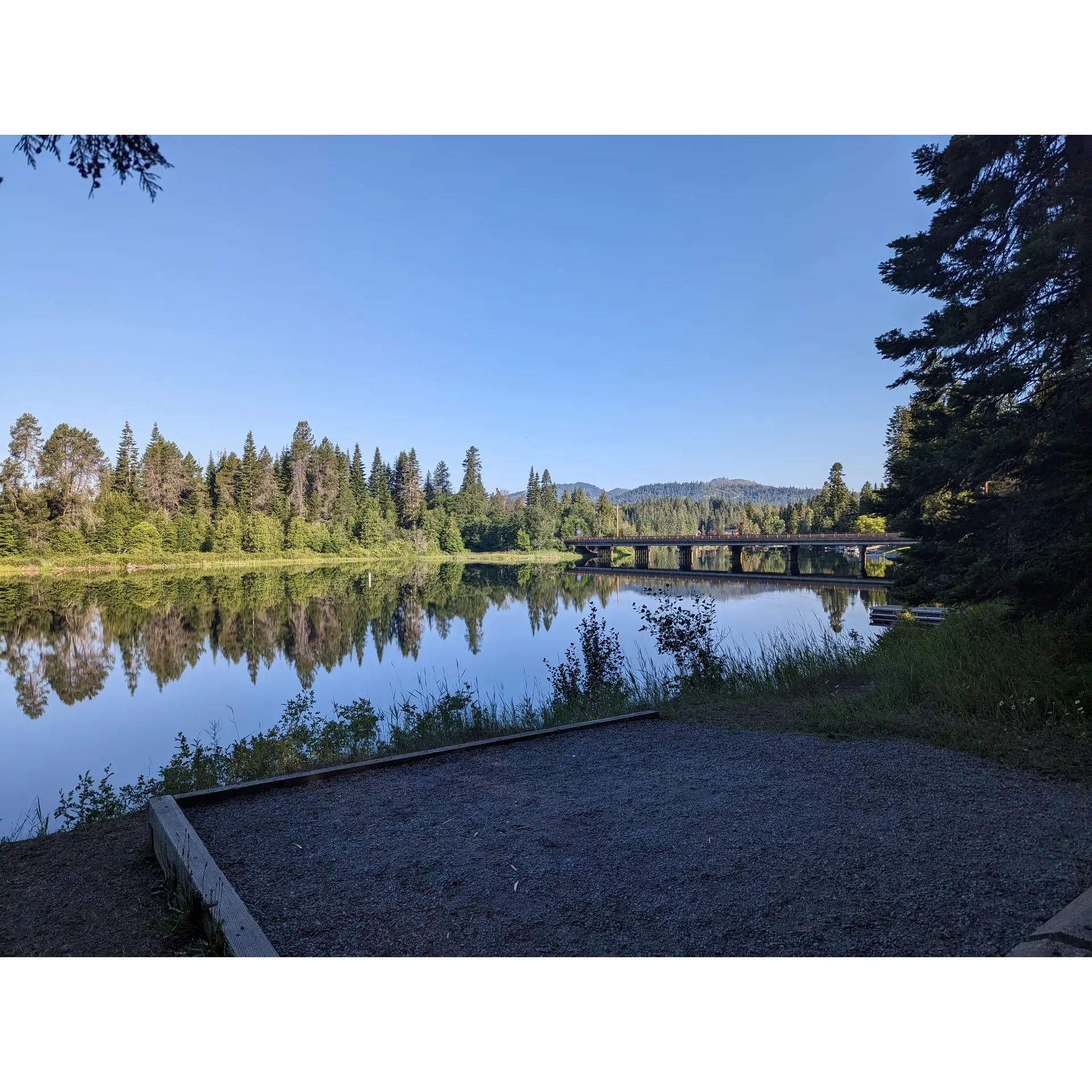 Priest River Campground offers a delightful retreat for camping enthusiasts and outdoor adventurers alike. With an emphasis on maintaining a classic camping experience, guests appreciate the simplicity and charm of this beautiful spot. The campground is praised for its exceptionally clean and well-maintained facilities, including restrooms with complimentary showers, ensuring a comfortable stay for all.

Visitors can make the most of the convenience provided by large sinks equipped with hot water, perfect for dishwashing after enjoying a meal under the stars. Easy access to water adds to the seamless nature of outdoor living here. Families are delighted by the child-friendly amenities, such as an engaging playground complete with fun structures and swings, which cater to the little ones' need for play and exploration.

One of Priest River Campground's standout features is the warm and welcoming hosts, who are celebrated for their kindness and friendliness. They contribute significantly to the positive atmosphere, ensuring guests feel right at home.

Those who appreciate traditional tent camping or travel with small trailers will find Priest River Campground particularly suitable, offering a refreshing escape from the more commercial glamping sites. The campground fosters a close-to-nature feel that resonates with down-to-earth campers and nomadic travelers.

In addition to the ample parking near the playground and beach areas, the campground boasts excellent amenities like bathrooms with showers and dedicated stations for fish cleaning, making it an ideal spot for anglers and beach-goers alike. The commitment to a genuine camping experience and attention to comfort makes Priest River Campground a favored destination for a memorable outdoor adventure. Description by ChatGPT.