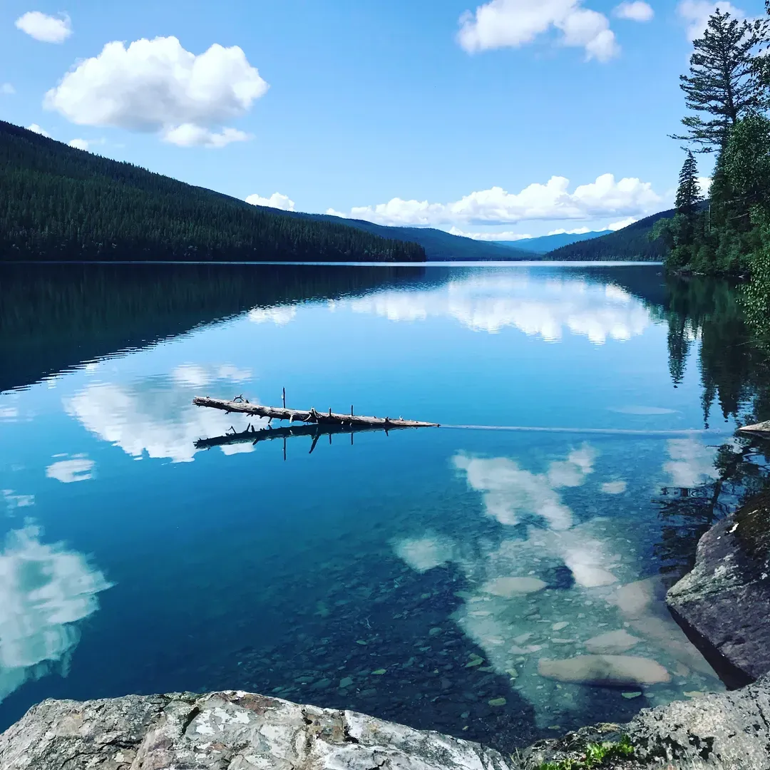 Head Bowman Lake Campground offers a pristine outdoor escape with its crystal-clear waters that beckon for admiration and relaxation. The well-thought-out layout ensures that each camping site is comfortably spaced out for privacy and tranquility. For convenience and safety, there is a designated food preparation and hanging area, catering to the needs of outdoor enthusiasts.

One of the campground’s highlights includes an inviting campfire area, perfect for gathering under the stars, fostering community, and sharing stories. Even with periodic fire restrictions, the ambiance of this natural setting remains undeniably serene and beautiful.

The local Rangers, known for their knowledge and friendliness, provide invaluable tips to enhance your stay, making every outing both seamless and memorable. For adventurers, a 7-mile hike presents an incredible opportunity to explore the surrounding beauty. Though it may challenge the occasional hiker, the breathtaking views that await are a rewarding culmination to the trek.

Visitors who have experienced Head Bowman Lake Campground in the summer months rave about its suitability for hammocks - a true testament to the campground's commitment to accommodating various styles of outdoor living. Moreover, its designation as a lovely backcountry campground further emphasizes the appeal of the hike that leads you there.

Head Bowman's idyllic setting serves as an ideal backdrop for reconnecting with nature, engaging in active discovery, or simply enjoying a peaceful retreat amid the majestic wilderness. Whether you're seeking solitude or setting out for an adventure, this campground is a gem for outdoor aficionados and casual explorers alike. Description by ChatGPT.