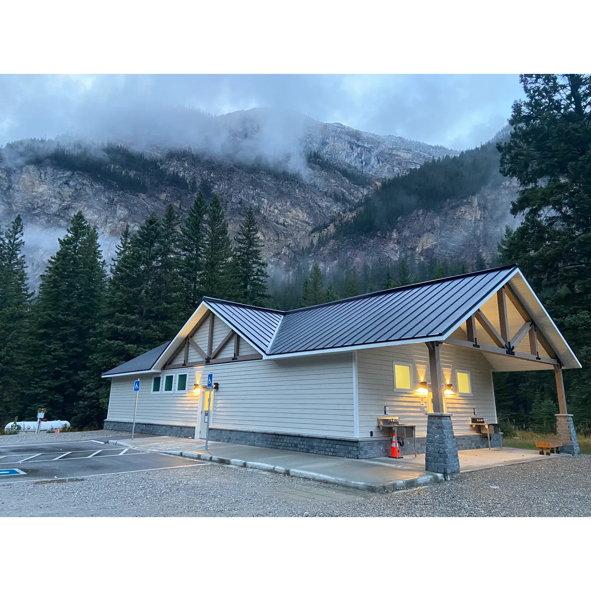 Kicking Horse Campground boasts a range of well-equipped campsites, offering a harmonious blend of comfort and outdoor adventure. The recently added shower block enhances the experience, providing modern and clean facilities for guests. Those looking for a serene retreat can find solace among the treed spots that provide ample shade and a sense of seclusion for tent campers, while other sites offer open spaces that cater to different preferences.

The campground is not just about rest and relaxation; it is also strategically positioned as the perfect base for exploring the natural wonders of the area, with proximity to breathtaking waterfalls and a variety of hiking trails. Convenience and natural beauty come hand in hand for those who choose to stay here.

Families visiting Kicking Horse Campground will appreciate the thoughtfully provided amenities, including a playground that keeps children entertained, and communal areas such as the dishwashing station enhance the practical aspects of camping. The addition of bear food storage lockers is a responsible nod to wildlife safety and guest comfort.

Attention to detail is evident in the facilities that cater to the needs of all campers, from those pitching a tent to visitors with trailers. Easy access to water spigots simplifies the setup process, and the clean, well-maintained grounds promote a welcoming atmosphere.

Knowledgeable and friendly staff are one of the campground's assets, known for their helpfulness and engaging educational presentations that enrich the camping experience for guests. Moreover, the availability of campfire permits, including a supply of wood for those campfire stories and marshmallow roasting sessions, adds to the authentic feel of outdoor living.

The breathtaking natural setting is further complemented by the peaceful ambiance provided by the nearby rushing river, creating a backdrop of soothing white noise that enhances the sense of escape from the hustle and bustle of everyday life. While ensuring modern conveniences are within reach, the campground remains committed to an environmentally-conscious approach, as evidenced by the amenities that blend seamlessly with the great outdoors.

Kicking Horse Campground is a true gem for those looking to immerse themselves in the natural beauty of the surroundings while enjoying the comforts of well-thought-out amenities and the warmth of excellent hospitality. Description by ChatGPT.