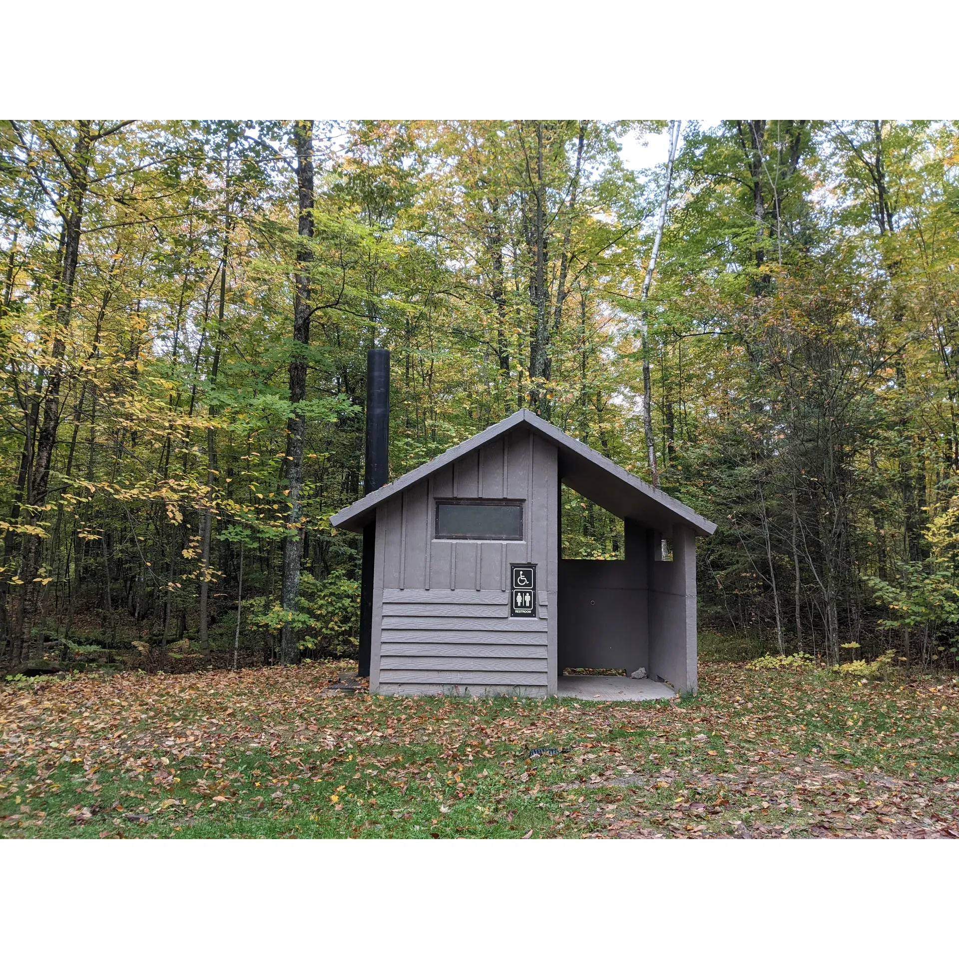 Moose Lake Campground offers a serene retreat for campers seeking a tranquil outdoor experience. This secluded haven lies at the culmination of a picturesque 7-mile gravel road journey, leading to a landscape brimming with privacy and natural beauty.

Each campsite promises an ambiance of seclusion and tranquility, with Campsite 3 boasting unrivaled panoramic views of the pristine lake. The spaces are generously sized and accommodate a range of outdoor accommodations, from the simplicity of tents to the convenience of RVs.

Anglers will find themselves in paradise, with the lake being an inviting spot for a day of fishing. Although not all visitors cast their lines, the presence of good fishing prospects adds to the allure of this tranquil spot.

Cleanliness and maintenance are clearly top priorities, with an emphasis on sustainable, primitive amenities. The campground is equipped with a classic-style outhouse that is kept in immaculate condition, ensuring that even the most essential facilities are thoughtfully tended to.

A beach area beckons those looking to while away the hours on shore, and the adjoining boat launch allows for an easy transition from land to water adventures. A sturdy dock provides the perfect launchpad for boating enthusiasts or a tranquil spot for contemplating the surrounding beauty.

One of the most cherished features of Moose Lake Campground is the digital detox it guarantees. Without cell reception, guests are given the ultimate excuse to disconnect from the demands of daily life and fully immerse themselves in their natural surroundings.

The campsites cater to diverse preferences, with large, level plots available for a comfortable setup. Even as the seasons shift, many look forward to the cooling temperatures of early fall, when the environment becomes even more idyllic and the call of the wild is irresistible.

For those longing for a peaceful outdoor escape, Moose Lake Campground is an exceptional destination. Here, the connection with nature is profound, the sites are inviting, and the promise of quiet relaxation is fulfilled with every stay. Description by ChatGPT.