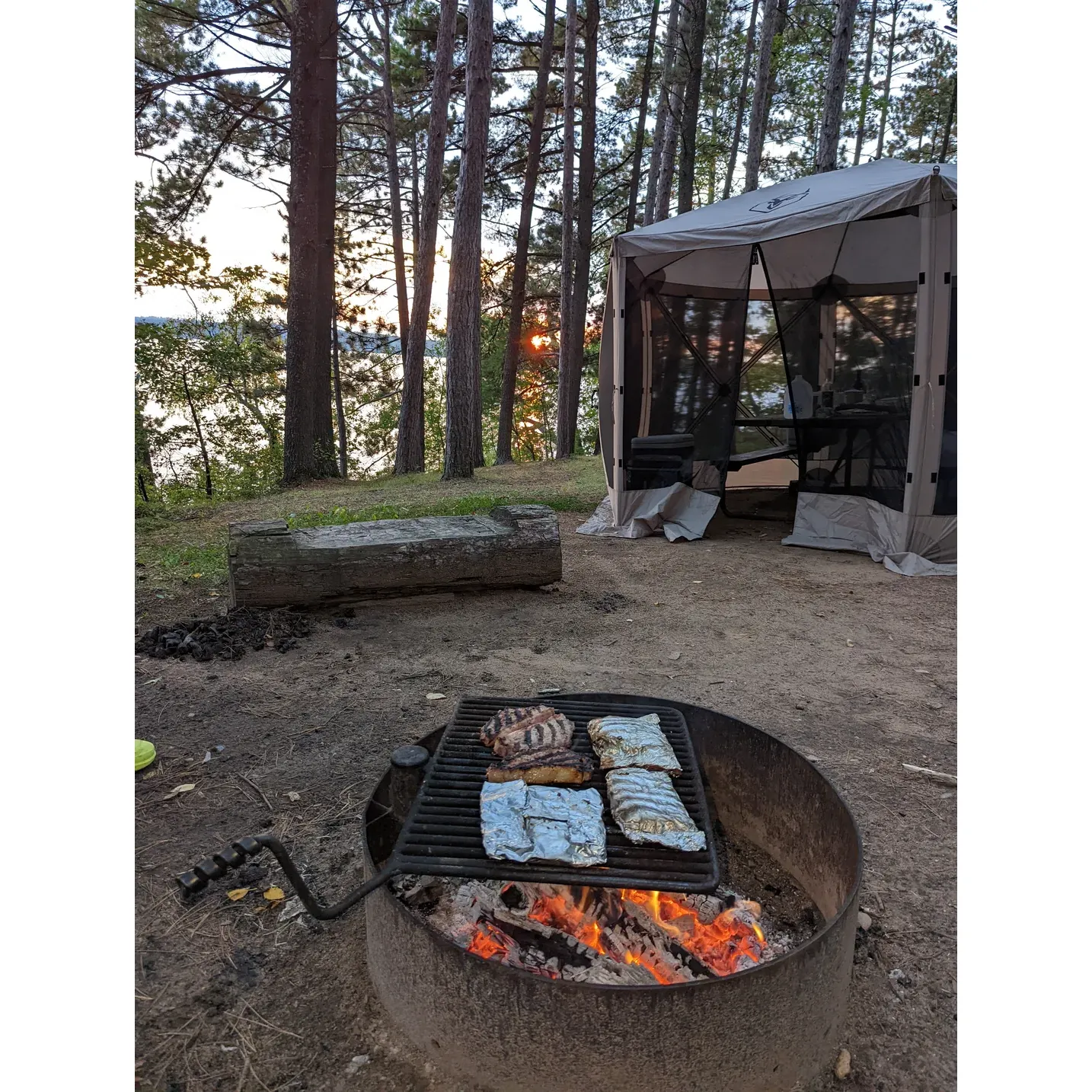 North Trout Lake Campground offers a picturesque outdoor experience, perfect for campers yearning for pristine, spacious sites amid beautiful natural surroundings. Set in an idyllic location, the campground provides an ideal setting for both relaxation and adventure. Campers can reap the benefits of easy-to-access, large, and clean campsites complemented by the convenience of onsite amenities such as firewood for sale and well-maintained vault toilets.

Surrounded by lush landscapes, the campground provides an array of opportunities for nature lovers, including a scenic walking trail perfect for an afternoon stroll. Outdoor enthusiasts will appreciate the ample availability of firewood thanks to the bountiful fallen trees, ensuring cozy nights around the campfire without the need to bring their own wood – just a saw to help gather the timber.

With a mix of power sites and walk-in sites, visitors can choose between the ease of drive-up access or the quiet seclusion offered by the tucked-away areas. The campgrounds are a delight for those who love the great outdoors but desire the creature comforts that make camping effortless and serene.

The proximity to a network of paved trails is a cyclist's dream, allowing for extensive bike rides to nearby St. Germain or Manitowish Waters while soaking in the breathtaking views along the way. For beach enthusiasts, this haven boasts campsites with direct access to the beach, where a hard sand bottom ensures an enjoyable swimming experience.

Open for the extended camping season, North Trout Lake Campground distinguishes itself as a tranquil retreat that beckons visitors back, year after year, to indulge in its outstanding vistas, particularly resplendent during the quiet of the night. Boating patrons can utilize the south boat launch for their aquatic adventures, and fishermen can pursue the challenge of catching Walleye and smallmouth, with local guides available to enhance the fishing experience.

Providing great value, with impeccably clean facilities, the campground is managed by dedicated staff who are committed to preserving the site's rustic charm and unique character. It remains a gem within the Northern Highland American Legion State program, and despite the upcoming reservation system integration, it remains an exceptional choice for spontaneous weekend getaways.

The peaceful surroundings, coupled with conveniences like nearby supply access, make North Trout Lake Campground a much-coveted destination for both seasoned campers and newcomers looking to create unforgettable memories in the great outdoors. Description by ChatGPT.