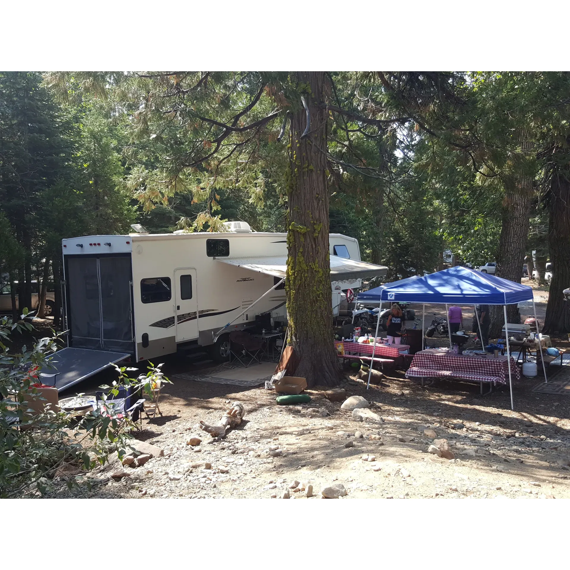 Gerle Creek Campground emerges as a cherished refuge for outdoor enthusiasts seeking a serene getaway, boasting a legacy of over two decades of visitor satisfaction. The continued improvements, including trail upgrades, ensure that the pristine beauty of the area is accessible to all, affirming its status as an inclusive retreat for nature lovers.

With a generous selection of campsites tailored to both tent campers and RV aficionados, this campground accommodates a wide range of outdoor living experiences. Recreational amenities are abundant, featuring picturesque beach areas perfect for lounging and an enticing boardwalk that invites guests to stroll over the calming waters. Those seeking adventure will revel in the opportunity to jump from the island in the middle of the lake, a unique feature that adds a touch of excitement to the tranquil surroundings.

The surrounding landscape unveils endless exploration prospects, with an inviting creek that beckons hikers and explorers of all ages. Angling enthusiasts take delight in the excellent fishing conditions, while the provision of potable water enhances the convenience of the wilderness experience. Smooth pavement throughout the grounds makes for an unexpected pleasure for skateboarders, adding another dimension to the array of available activities.

The well-maintained environment ensures a safe haven for families and pets alike. While the presence of wildlife is part of the natural charm, the campground is equipped with bear boxes, providing peace of mind and safety for visitors and their belongings.

Visitors often find themselves surrendering to the digital detox enforced by the lack of cell service, a hidden blessing that fosters reconnection with nature and loved ones. The intimacy with the great outdoors continues with lakeside and creekside campsites that awaken the senses to the sounds of water and wildlife, offering a tranquil escape from the bustle of modern life.

The enchantment of Gerle Creek Campground is captured in the cherished memories that echo through the stillness of dawn, where morning mist dances across a mirror-like lake, opening a day of promise and tranquility. With its close proximity to the renowned Rubicon Trail, the campground serves as an ideal base camp for off-road enthusiasts looking to embark on thrilling adventures.

With a heartfelt endorsement from long-time visitors and a setting that maintains a sense of seclusion even when full, Gerle Creek Campground stands as a timeless destination that calls for repeated visits and promises new memories in the grand canvas of the great outdoors. Description by ChatGPT.