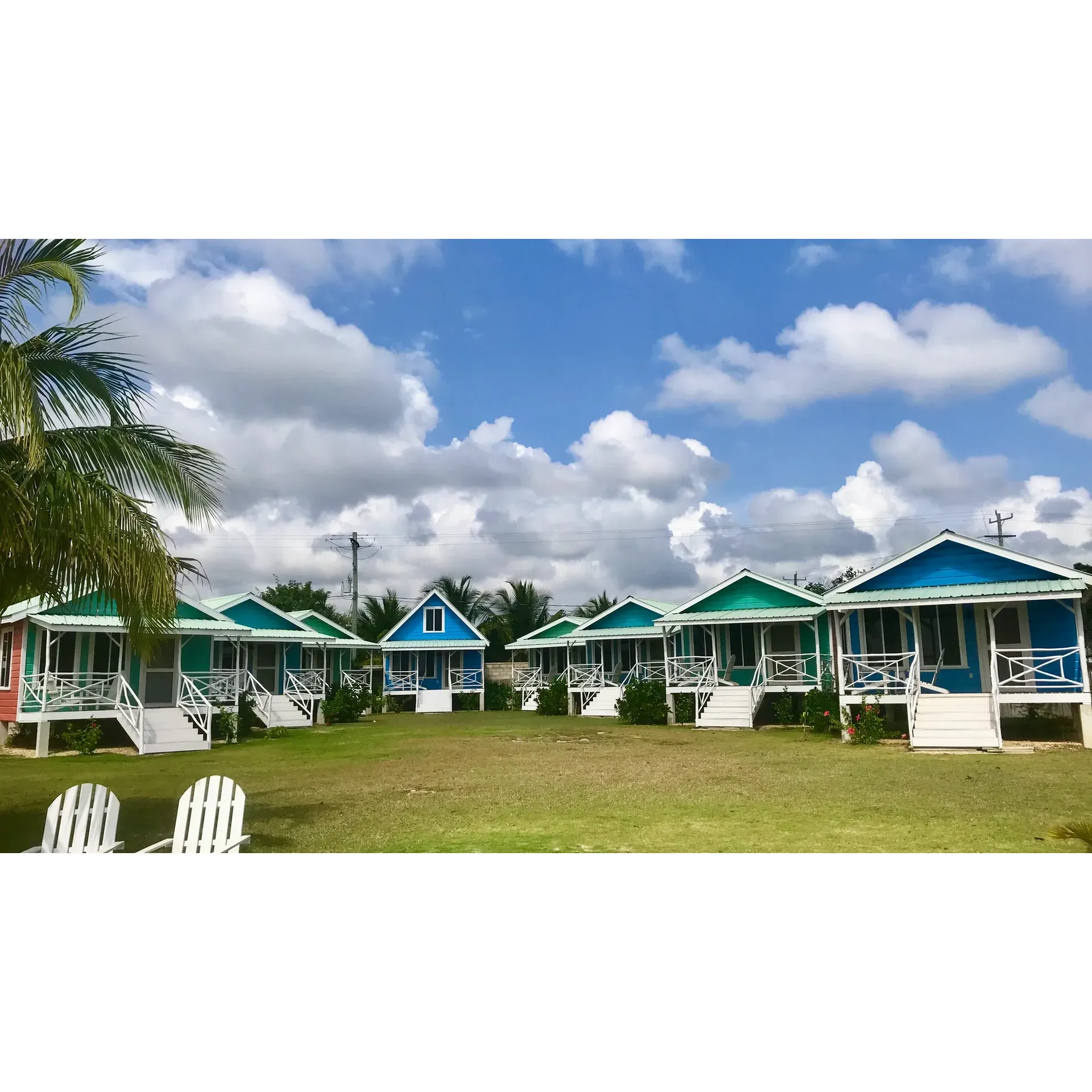 Tilt-Ta-Dock Resort Belize, set against the tranquil backdrop of Corozal's breathtaking scenery, offers an uplifting retreat where luxury, beauty, and hospitality intertwine to create an unforgettable getaway. With its meticulously maintained property and an array of inviting bungalows, each guest is greeted with the epitome of comfort and cleanliness. The stylish décor complements the natural surroundings, ensuring all modern amenities are at your fingertips.

The resort's crowning glory is the pristine swimming pool, a serene oasis perfect for relaxation amidst the lush greenery. The personalized attention from the warm and affable owners, Joe and Laura, enhances the experience, as they are ever-present to ensure that every moment of your stay is outstanding. Their efforts to provide exceptional service have made Tilt-Ta-Dock not just a stay but a delightful experience that guests eagerly recommend.

An idyllic escape for those seeking a peaceful retreat, the resort boasts additional leisure offerings such as kayaks and bicycles, inviting guests to explore the beauty of Belize at their own pace. The onsite dock stands as a favored spot for catching sunrises and sunsets, painting a picturesque start and end to each day.

With a secure environment that gives peace of mind, especially to solo travelers, Tilt-Ta-Dock ensures a sanctuary of safety and comfort. While its sequestered location promises a serene environment, it remains within accessible reach from bustling town life, giving guests the flexibility to savor local cuisine and engage with the Corozal community.

Affirmations from those who have indulged in the Tilt-Ta-Dock experience echo the sentiment that it isn't just a resort—it’s a dreamlike escape from the ordinary. Both individuals and couples like Gail and Mark, who seek prolonged stays to bask in near-perfection, find their expectations surpassed. Even the on-site bartending adds a touch of delight, offering spirited fun and engagement.

Tilt-Ta-Dock Resort Belize stands as more than just accommodations—it is a destination where memories are made, connections are fostered, and the allure of Belize is captured in every enchanting moment. Whether you're planning a return visit or bringing friends along for the journey, the resort promises an immersive experience that is both accessible and luxuriously affordable. Description by ChatGPT.