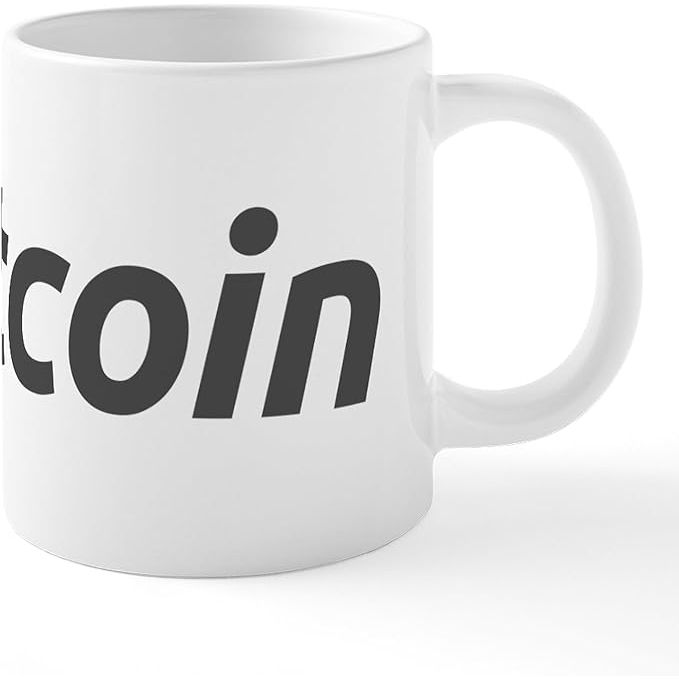 The CafePress Mug with the Bitcoin logo and name is a ceramic coffee mug and tea cup that holds up to 20 oz of liquid. The mug features the Bitcoin logo and name prominently displayed on the front, making it a great gift for cryptocurrency enthusiasts or a stylish addition to your kitchenware collection.