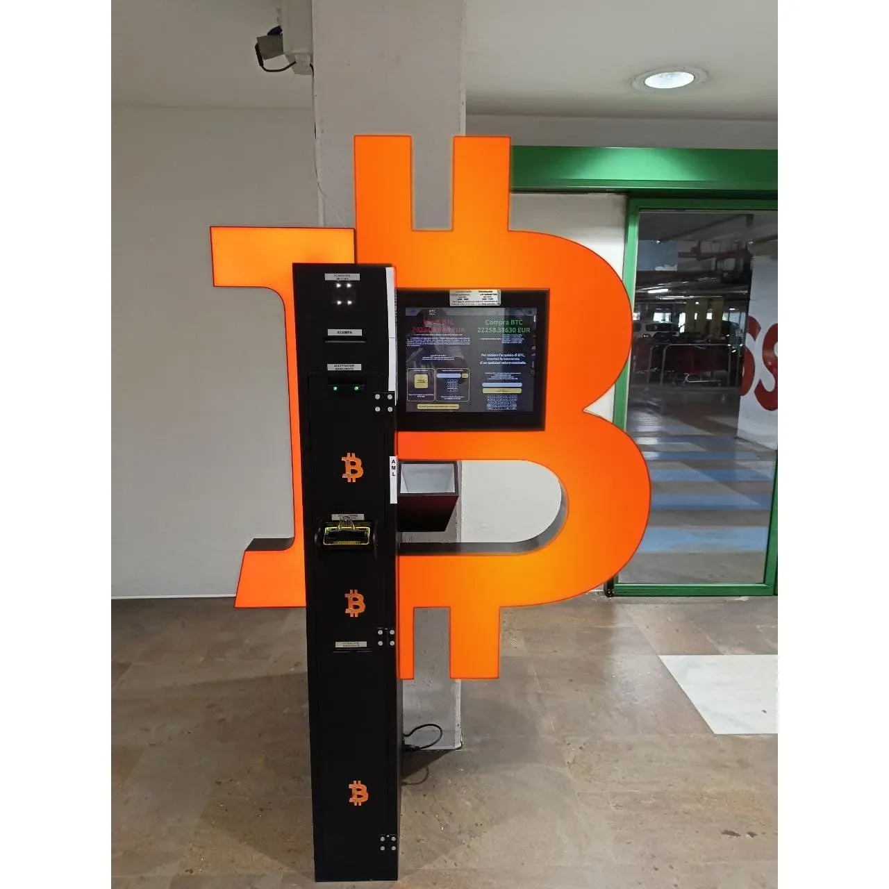 Bancomat Bitcoin ATM by Shitcoins.club stands out as a forward-thinking financial service kiosk, providing customers with a seamless, user-friendly interface that simplifies the process of buying and selling a variety of cryptocurrencies. The ATMs are recognized for their innovative technology that empowers both the crypto-curious and experienced traders to engage with the digital economy.

Customers frequently commend the ATMs for the brilliant service they offer, which includes quick transactions and the convenience of multiple locations, allowing for easy access to digital assets. Shoppers are particularly impressed with the straightforward transaction process, which facilitates effortless navigation for individuals regardless of their previous crypto experience.

The ATMs are part of the growing network by Shitcoins.club, which is dedicated to enhancing the usability of cryptocurrencies and expanding the accessibility of digital currency transactions. The ATMs support a diverse range of cryptocurrencies, thus catering to various preferences and needs. This variety ensures that users have the flexibility to engage with the digital currency market in a way that fits their investment strategy.

Users also appreciate the sense of empowerment provided by the autonomy over their transactions, complimenting the sense of control and independence they experience when using the ATMs. The combination of a well-designed machine interface, operational efficiency, and the support of a range of digital currencies creates an environment that is conducive to the positive adoption and use of cryptocurrencies. 

The company's commitment to providing a standout service is evident in the design and functionality of the ATMs, which are continuously updated to align with the latest trends and user requirements in the cryptocurrency arena. This dynamic approach to service underscores Shitcoins.club's role as a facilitator in the modern digital economy, exemplifying their dedication to customer satisfaction and an enhanced user experience. Description by ChatGPT.