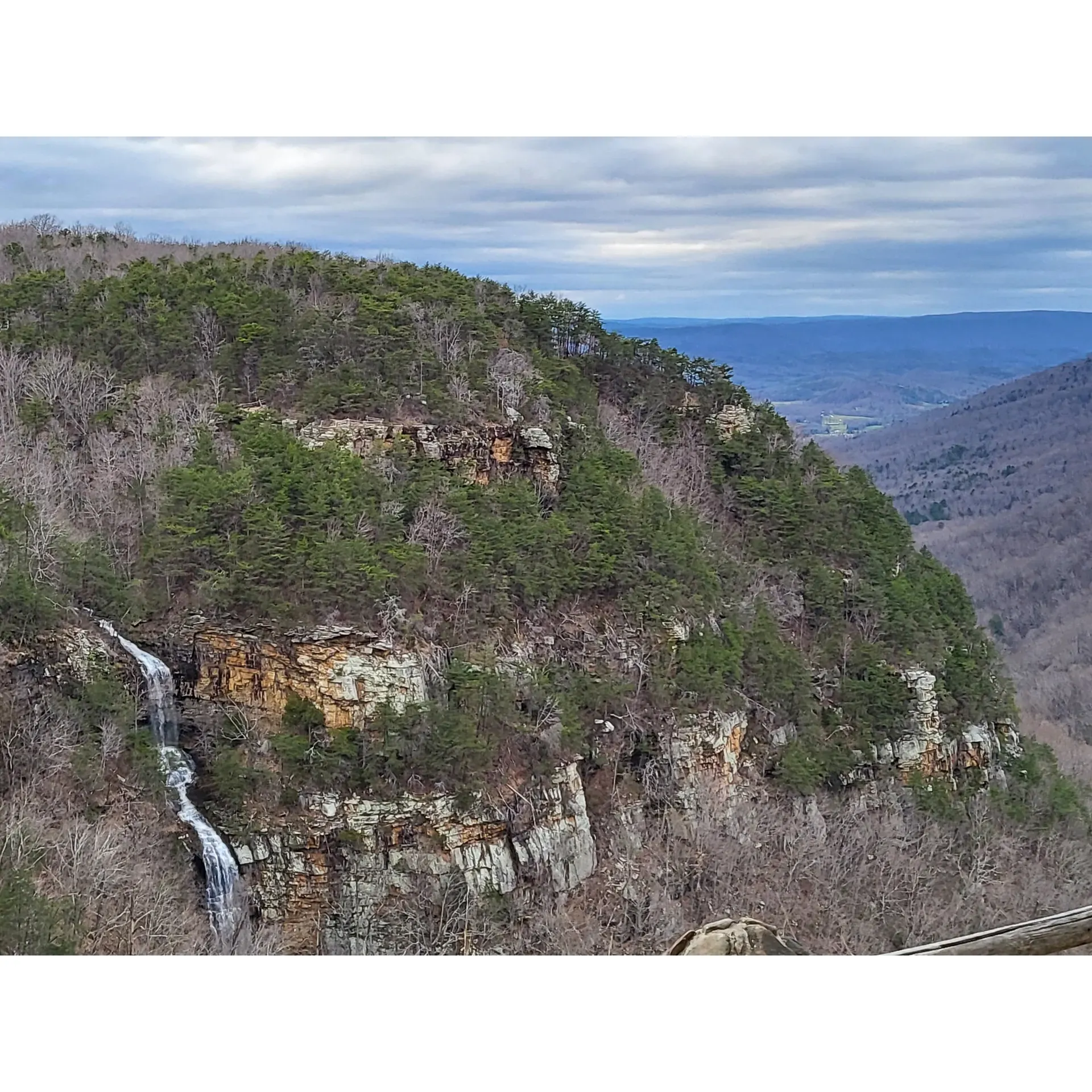 Cloudland Canyon Walk-In Campground is a picturesque camping destination offering an array of outdoor experiences for nature enthusiasts and campers seeking an affordable retreat. The campground is well-regarded for its beautiful campsites, with the first five sites providing convenient proximity to parking and modern bathroom facilities, ensuring comfort just steps away. For those desiring more seclusion, sites 10 through 17 are spread out, offering a more private and spacious camping experience surrounded by nature's tranquility. 

Campers seeking the blend of accessibility and solitude will find sites 18, 19, and 20 to be prime picks, close to amenities while adjacent to the soothing sounds of a nearby creek. The soothing sound of flowing water can lull you to sleep at several sites, providing a peaceful night's rest under the stars. 

All campsites are equipped with a picnic table and fire pit complete with a grill, perfect for outdoor meals and evening bonfires. Affordable camping is further underscored by only requiring payment for parking fees, making it an excellent choice for budget-conscious travelers. 

The recently upgraded bathrooms, complete with heaters, provide much-needed warmth on chilly nights, complementing the campsite's natural charm. The convenience of the campground layout means that even the farthest site is a mere short walk from the facilities and parking, allowing for easy loading and unloading of camping gear.

One of the campground's most celebrated features is the direct access to the scenic West Rim Trail. Hikers can embark on the trail directly from their campsites, particularly from the coveted site 19, which serves as a gateway to immediate adventure and breathtaking views.

Campers can purchase firewood on-site and enjoy the added amenity of clean toilets and showers, ensuring a comfortable stay. With the campsite connected to the wider trails of the park, guests can venture out on hikes that lead to stunning vistas just a 30-minute trek away. Overall, Cloudland Canyon Walk-In Campground presents a wonderful blend of natural beauty, convenience, and peaceful seclusion for an unforgettable camping experience. Description by ChatGPT.