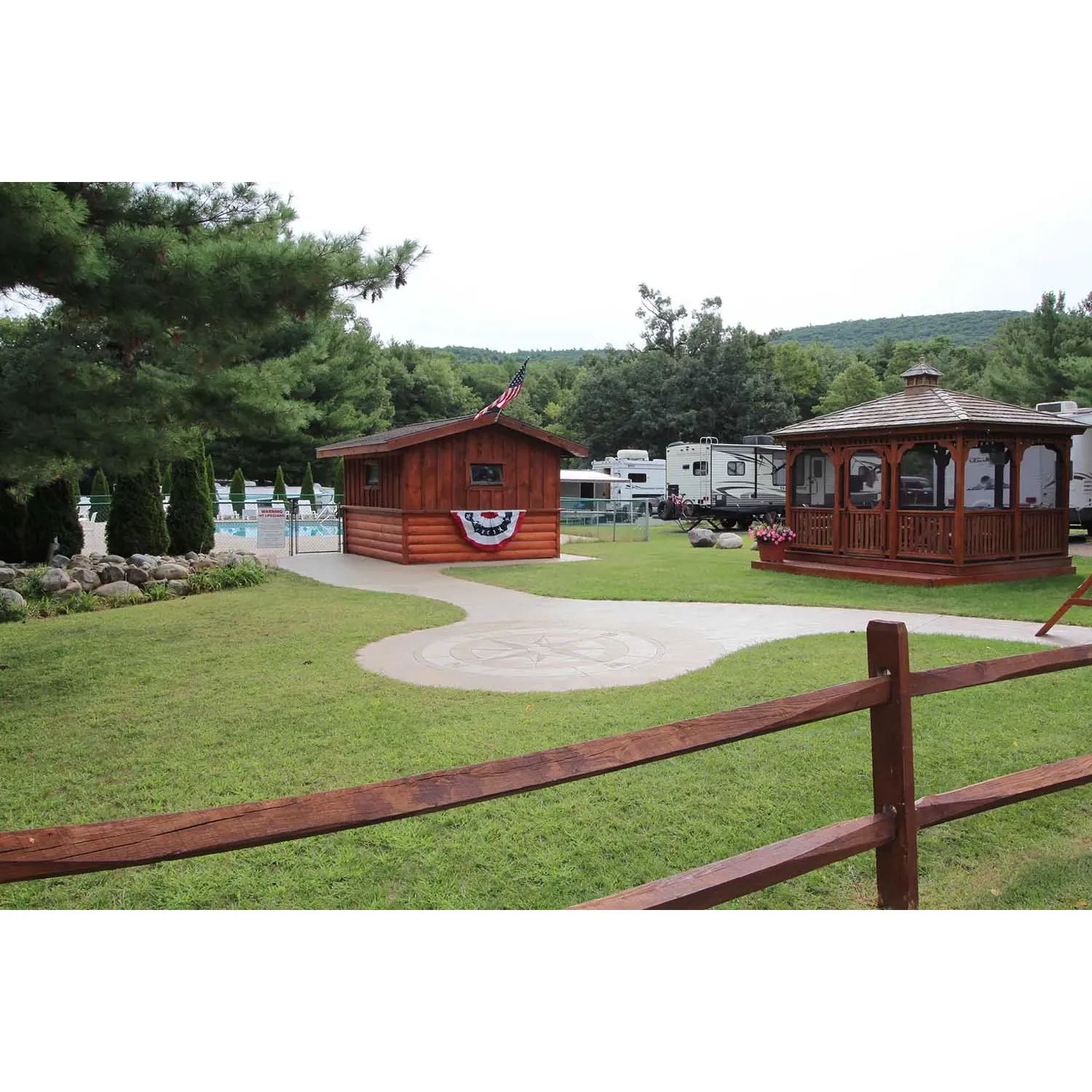 King Phillips Campground & Resort offers a welcoming retreat for RV enthusiasts and camping aficionados alike, set in the scenic surroundings near Lake George. This coveted destination boasts impeccably maintained grounds where the blend of accessibility to local attractions and a commitment to cleanliness stands out. With a range of well-kept, level, and private RV sites, the campground provides guests with a unique sense of seclusion in a wooded backdrop. 

Guest satisfaction is at the forefront, evident in the spotless condition of the facilities, including pristine bathrooms and showers that receive continuous praise for their cleanliness. The hospitable and efficient staff are a cornerstone, providing excellent service and attending promptly to the needs of each visitor, ensuring a comfortable and hassle-free stay.

King Phillips Camppronud and Resort is an entertainment hub, offering an array of activities from music events and movie nights to bike paths, all within proximity to additional recreational options such as miniature golf, shops, dining, and amusement parks. The amiable community atmosphere is enhanced by fellow campers who are both friendly and respectful, fostering an environment ideal for making lasting memories.

Convenience is a highlight here, with a thoughtfully stocked on-site store that caters to all camping essentials at reasonable prices. Though this locale is perfectly situated among the pine trees providing shaded sites, the meticulous ground staff are always on hand, ready to assist and engage in friendly conversations, making every effort to ensure guests' stays are anything but ordinary.

King Phillips Campground & Resort emerges as a prime choice for those seeking a well-rounded camping experience in Lake George, where the emphasis on a clean, enjoyable, and community-oriented getaway resonates with many who choose to return time and time again. Description by ChatGPT.