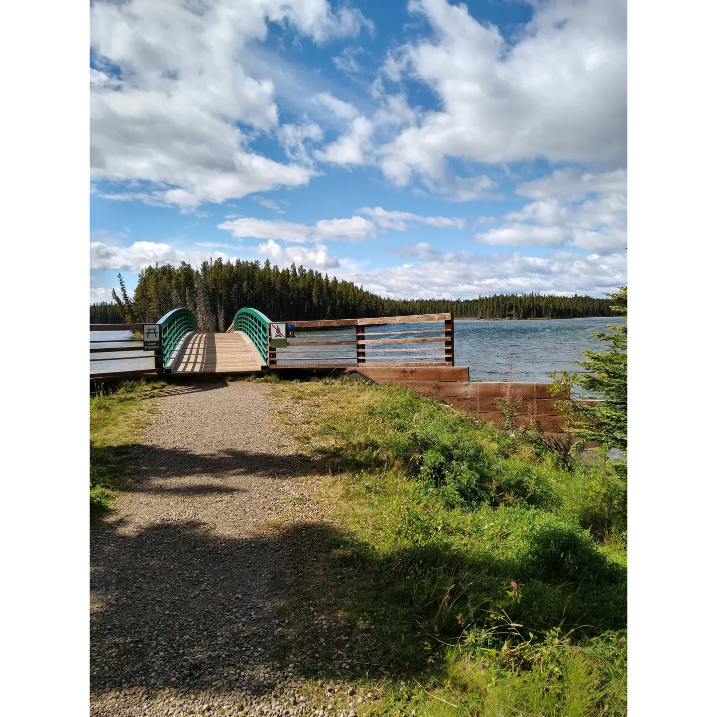 Pierre Grey's Lakes Provincial Park is a spellbinding oasis that exudes a welcoming retreat for nature enthusiasts and outdoor adventurers alike. With its swath of well-manicured, spacious campsites, visitors relish the privacy and the immersive experience provided by the abundant trees. These natural havens are a sanctuary for anyone wishing to disconnect and bask in the serenity of the great outdoors.

Encircled by a trilogy of crystal clear lakes, the park beckons kayakers, canoeists, and anglers to leap into its tranquil waters. The transparency of the lakes is so profound that it's not uncommon to glimpse trout swimming beneath the surface, making for an incredible sight and a satisfying fishing experience. The gentle lakes ensure a pleasant setting for water activities, even when the wind picks up.

The verdant landscape of the park is crisscrossed with immaculate biking and hiking trails inviting visitors to explore the beauty on wheels or foot. Meanwhile, for a rustic touch, the park offers pit toilets that stand out for their cleanliness, alongside readily available firewood upon check-in, accentuating the convenience of any camping trip.

As you delve into the surrounding areas, the Grande Cache Tourista Centre emerges as a notable attraction, offering insights into the local gems waiting to be discovered. Enthusiasts can venture to the nearby recreation center, or seek out the natural wonders of Sulfur Gates, Split Rock, Eton Falls, and Muskeg Falls with their stunning and powerful waterfalls.

While the park imbues a remote ambiance, it remains within a comfortable proximity to Grande Cache, ensuring that urban amenities are just a short drive away. Wildlife thrives in this park, with opportunities to observe grizzly bears, loons, and white-tailed deer in their natural habitats.

Pierre Grey's Lakes Provincial Park is a sanctuary offering a tapestry of lush landscapes, shimmering waters, and exhilarating trails, all crafted to create an enchanting and restful camping experience where the beauty of Alberta truly shines. Description by ChatGPT.