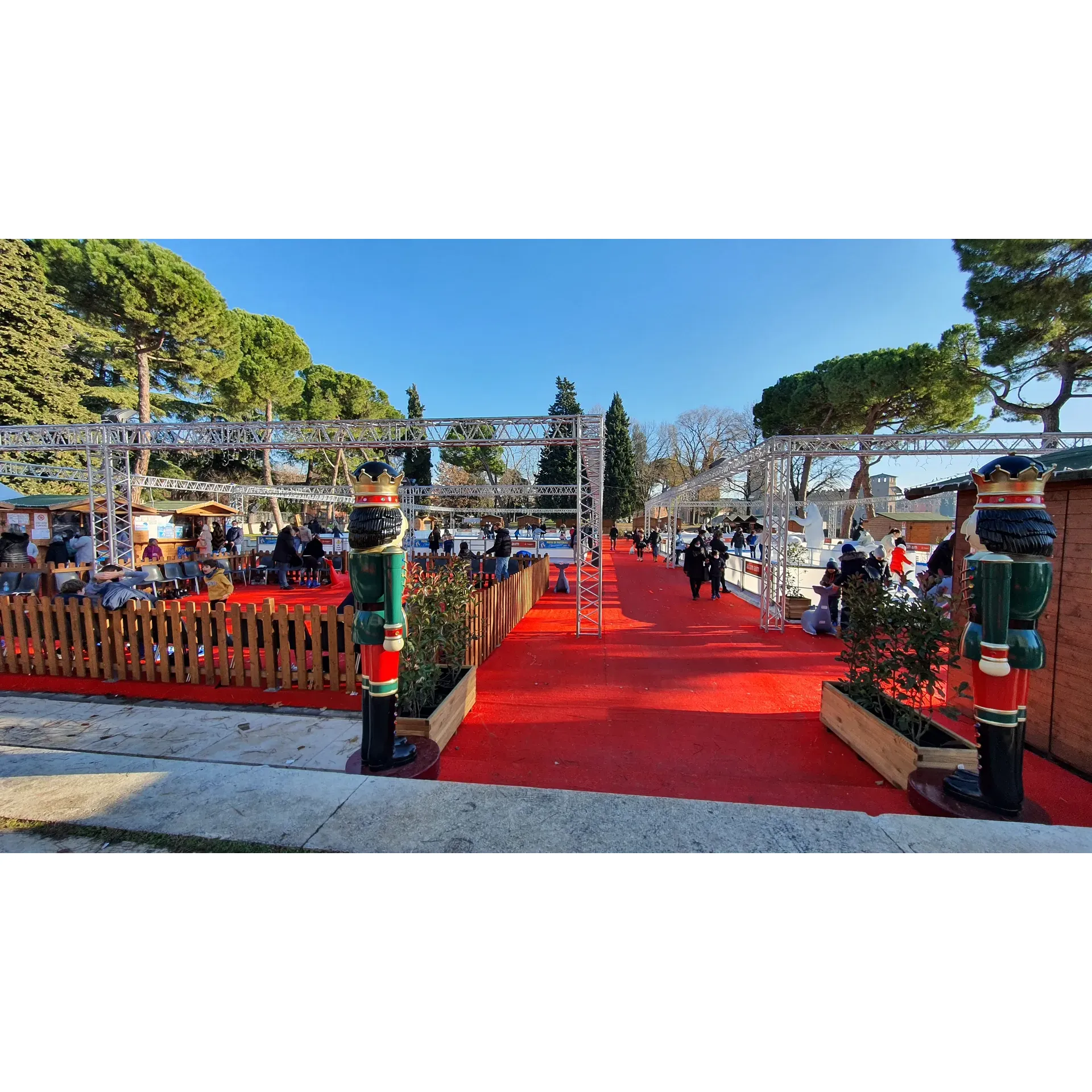 Immerse yourself in the joy and elegance of ice skating at our vibrant winter ice rink, celebrated by visitors for its enchanting atmosphere. Skaters of all ages admire the dedication of our skate personnel, who are always on hand, embracing the local Veronese finesse, ensuring everyone's experience is seamless and enjoyable.

The rink comes alive with delightful entertainment, providing guests with a grand mix of amusement and spirited ice activities. Supplementing the skating experience, the rink features exceptional food service options, allowing guests to refuel with delicious fare without missing a moment of the excitement.

More than just an ice rink, this winter wonderland becomes a hub of activity and joy, drawing in locals and tourists alike to revel in the timeless tradition of gliding across the ice. The rink’s layout, designed with careful consideration for the attendees' needs, includes amenities such as ticketing, refreshment counters, skate rental facilities, and a dedicated children's ring, all fashioned to enhance the overall visitor experience.

The picturesque scene at the rink is further enhanced by the beautifully-maintained ice surface, providing a safe and smooth glide for every skater. Thoughtful organization ensures that everyone, regardless of skill level, has a space to enjoy, with special tracks designed to keep younger skaters secure while allowing more experienced skaters to show off their skills.

Visitors continually describe the ice rink as both "pretty" and "beautiful," highlighting the magical aesthetic that captures the quintessence of wintertime fun. As an ideal destination for friends, families, or solo adventurers, the rink promises a delightful escape and a chance to create cherished memories on the ice. Description by ChatGPT.