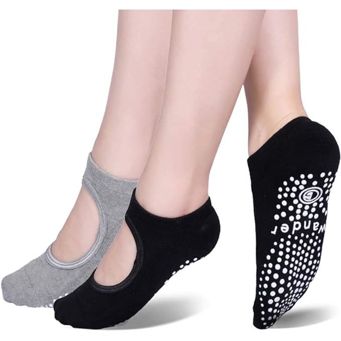 Yoga socks, also known as non-slip or skid socks, are specially designed footwear for practicing yoga, pilates, ballet, or barre exercises. These socks are equipped with grips on the sole to provide traction and stability during movement, allowing practitioners to maintain their balance and avoid slipping on smooth surfaces.