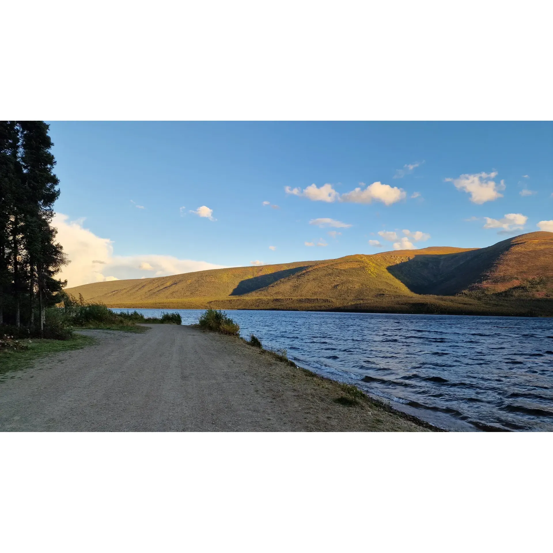 Ethel Lake Campground is a picturesque outdoor destination showcasing the breathtaking beauty of a serene lake embraced by majestic mountains. Guests are enchanted by the scenic journey, spanning 24 kilometers, that guides them into the heart of a tranquil haven, recently enhanced by thoughtful road repairs ensuring a smoother arrival experience.

Though the passage may present an exciting challenge with its series of switchbacks and tight curves, it rewards travelers with awe-inspiring vistas and an intimate connection with the wilderness. This spot is a dream for campers yearning for simplicity and natural splendor, offering cozy amenities to complement its rustic charm.

Visitors are captivated by the remarkable landscape, particularly the stunning visual treat of acres of fireweed in full bloom—a regenerative miracle following nature's cycles. Photographs barely capture the full extent of Ethel Lake Campground's grandeur, which has been hailed as an idyllic retreat for returning adventurers.

With a landscape that's both tranquil and vibrant, the campground serves as a perfect base for guests looking to immerse themselves in the great outdoors. Whether seeking a peaceful escape or a backdrop for memorable outdoor activities, this location promises an unforgettable experience for all who venture here, earning its place as many travelers' ultimate camping spot. Description by ChatGPT.