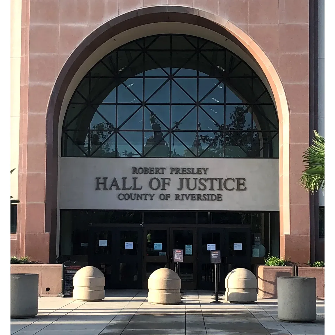 The Superior Court of California, County of Riverside - Riverside Hall of Justice is a prominent legal institution known for its dedication to maintaining a clean and well-organized environment. It serves as a vital hub for the administration of justice, where countless individuals fulfill their civic duties through jury service each year.

The courthouse has garnered positive remarks for its well-kept facilities, highlighting its commitment to providing a suitable environment for all court-related activities. Visitors and jurors alike can appreciate the meticulous attention to cleanliness, ensuring a more pleasant experience during their time at the courthouse.

An accommodating attribute of the Riverside Hall of Justice is the availability of designated juror parking lots and a trolley service, enhancing convenience for those attending. This thoughtful feature is indicative of the court's efforts to streamline the jury process and remove any transportation barriers that could hinder participation in the judicial process.

Courteous interactions with the staff are another commendable aspect of the Riverside Hall of Justice. The friendliness and professionalism of the security personnel at the entrance checkpoints contribute to a respectful and secure atmosphere, setting a positive tone for visitors as they navigate through their legal proceedings.

Furthermore, the courthouse's efficient handling of cases has led to instances of fair and just outcomes, lending credence to the belief in the effectiveness of the local justice system. This perception is bolstered by testimonies from individuals who have experienced fair treatment and second chances, reinforcing the court's role in ensuring equity under the law.

The Riverside Hall of Justice stands as a testament to the integrity and functionality of the legal system, providing essential services to the community with a focus on fairness, respect, and orderliness. Description by ChatGPT.