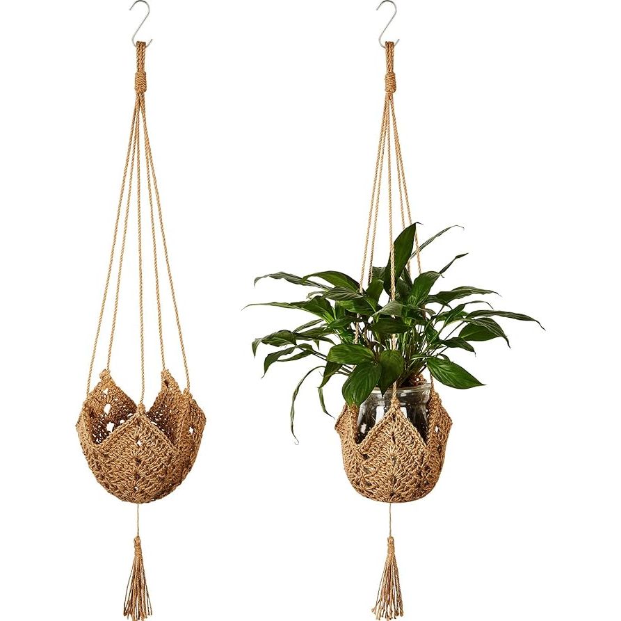 The Shappy 2 Packs Macrame Plant Hangers are a stylish and functional way to display your favorite plants indoors or outdoors. Made of durable jute crochet, these hangers have a boho-chic design that will add a touch of charm to any space. Each hanger comes with 2 S shaped hooks for easy hanging on walls, fences, or plant stands.