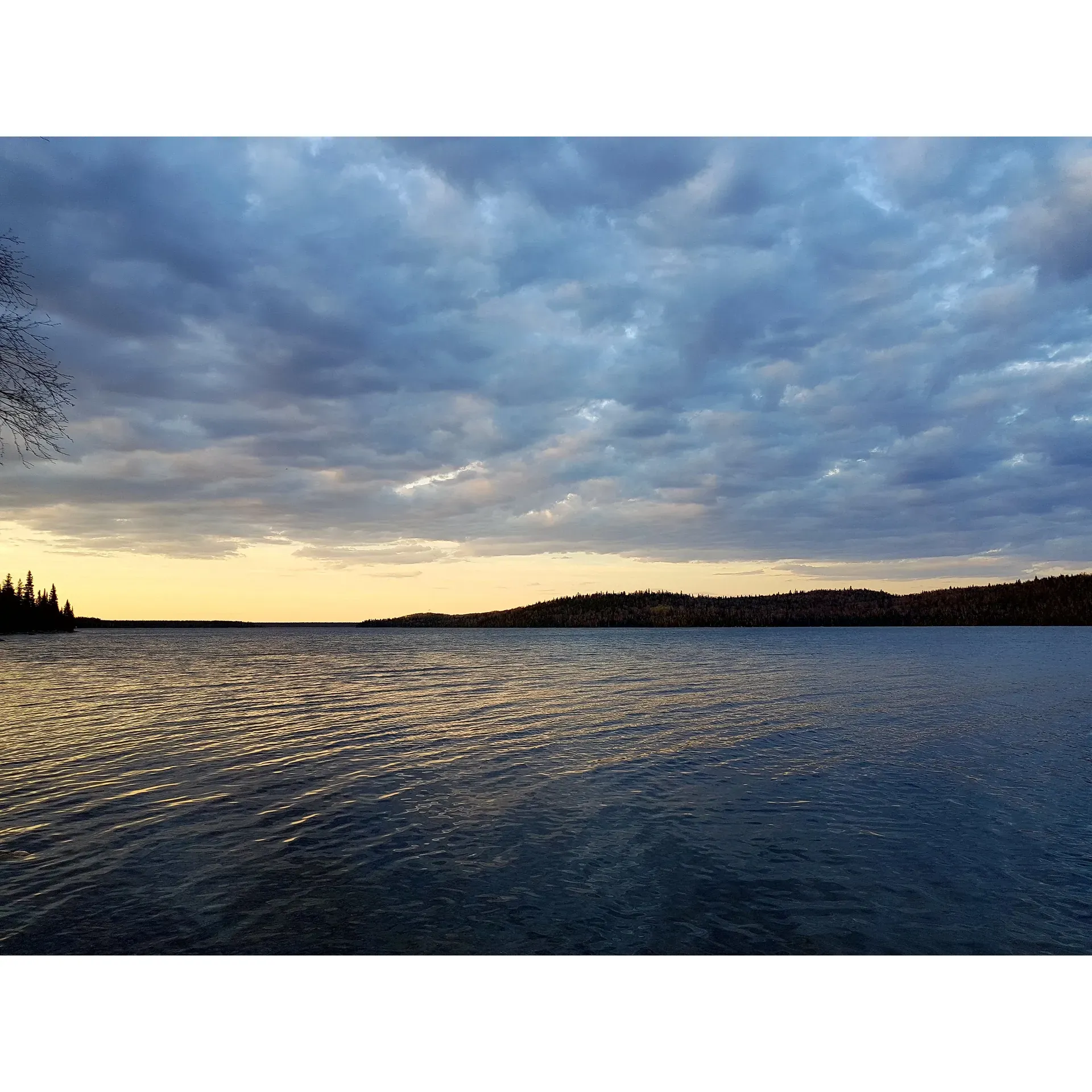 Situated amidst the tranquility of a picturesque landscape, Wakami Lake Provincial Park presents an idyllic retreat for outdoor enthusiasts and families alike. Renowned for its outstanding angling opportunities, the park lures avid fishermen eager to indulge in the serenity of undisturbed waters abundant with fish.

Visitors consistently praise the unrivaled quietness of the park, making it an ideal setting for those looking to escape the hustle and bustle of city life. The majestic scenery, characterized by a pristine lake that mirrors the sky, offers a stunning backdrop for tenting adventures. Guests of all ages, including four-legged family members, find a welcome retreat in this lush oasis, often remarking on the well-appointed campsites that blend seamlessly into the natural environment.

Compliments abound for the park's congenial rangers and staff, who are celebrated for their exceptional service. The park's ethos of warm hospitality is evidenced by its growing family of return visitors, many of whom now consider it a must-visit destination in Ontario. They find delight in the tranquil ambiance that encourages rejuvenation of the spirit.

While the park's rustic charm invites a digital detox due to the lack of cell service, the absence of modern distractions adds to the appeal for those looking to reconnect with nature. Despite the simplicity of facilities, the park more than compensates with its clean and private waterfront campsites, fostering intimate encounters with the great outdoors. Activities such as swimming and sunbathing along the lake's edge bring joy to summer visitors.

Adventurers can further explore the lake's beauty by renting small motorboats, canoes, and kayaks, fostering memorable experiences paddling along the serene waters. Convenient access to necessities like ice and firewood enhances the camping experience, ensuring that all essentials are at hand.

Wakami Lake Provincial Park stands as a cherished gem within the Ontario parks system, promising unforgettable moments and a sense of peace that can only be found in the heart of nature, just a journey away from the urban centers. Whether seeking solitude, adventure, or a family getaway, visitors can expect a delightful encounter with the great Canadian outdoors. Description by ChatGPT.