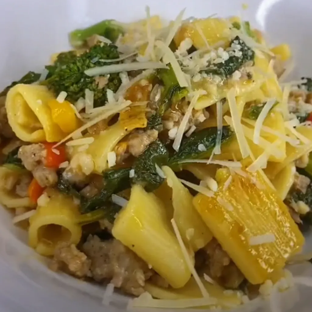 This delightful and hearty one-pot meal combines the savory flavors of sausage with the earthy taste of broccoli rabe. Perfect for family dinners, this dish is bound to please both kids and adults alike.