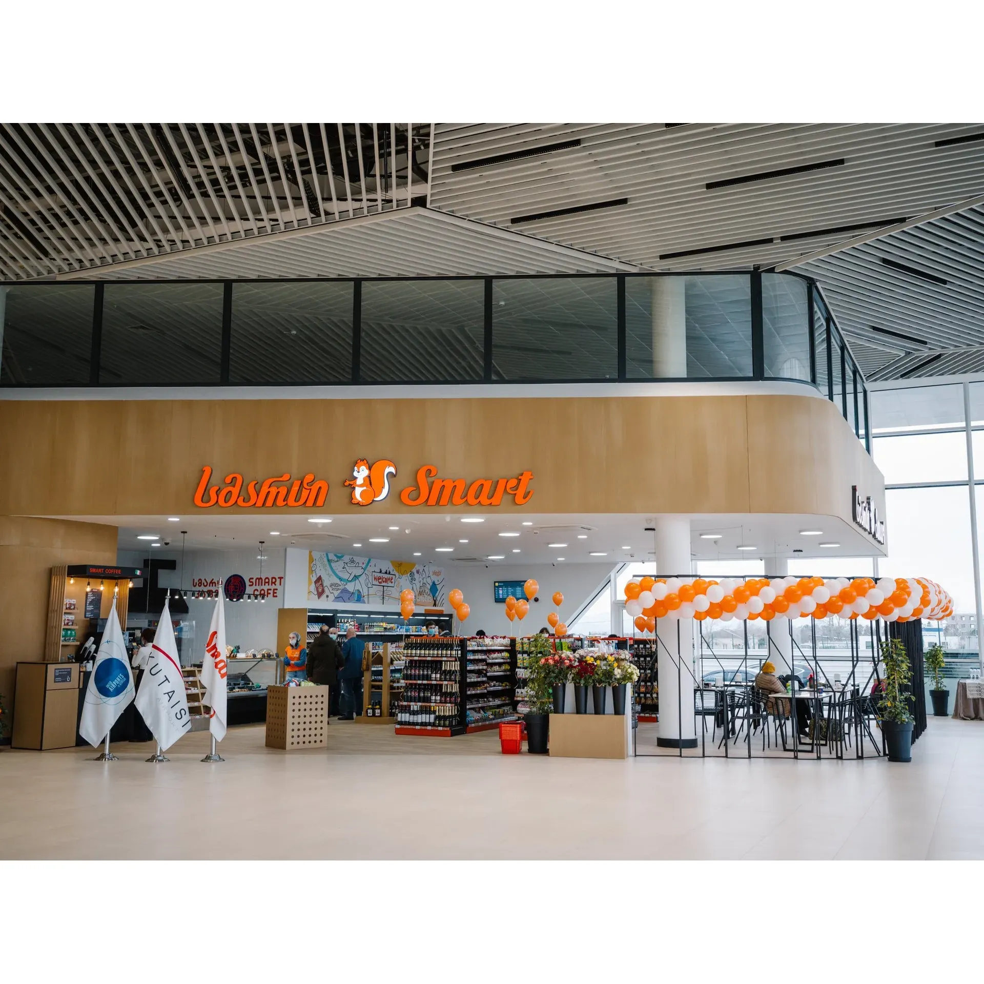 Smart is a convenient retail establishment, strategically situated to serve travelers at Kutaisi airport, offering essential items to cater to the immediate needs of passengers before their flights. Customers have acknowledged that the store provides a selection of products at fair prices, ensuring they can pick up any last-minute essentials without a significant markup often seen in airport locations.

The service at Smart is efficient, with a team dedicated to facilitating a smooth and friendly shopping experience. Patrons have noted the good service provided, reflecting the staff's commitment to customer satisfaction. As the sole café option before security checks, Smart plays a crucial role for travelers seeking a quick bite or a beverage before their departure.

With attention to upholding a positive patron experience, Smart aims to maintain a customer-focused environment. As an integral part of the travel experience at Kutaisi airport, Smart looks to contribute positively to the impressions of visitors, offering them a reliable place to shop as they prepare to embark on their journeys. Description by ChatGPT.