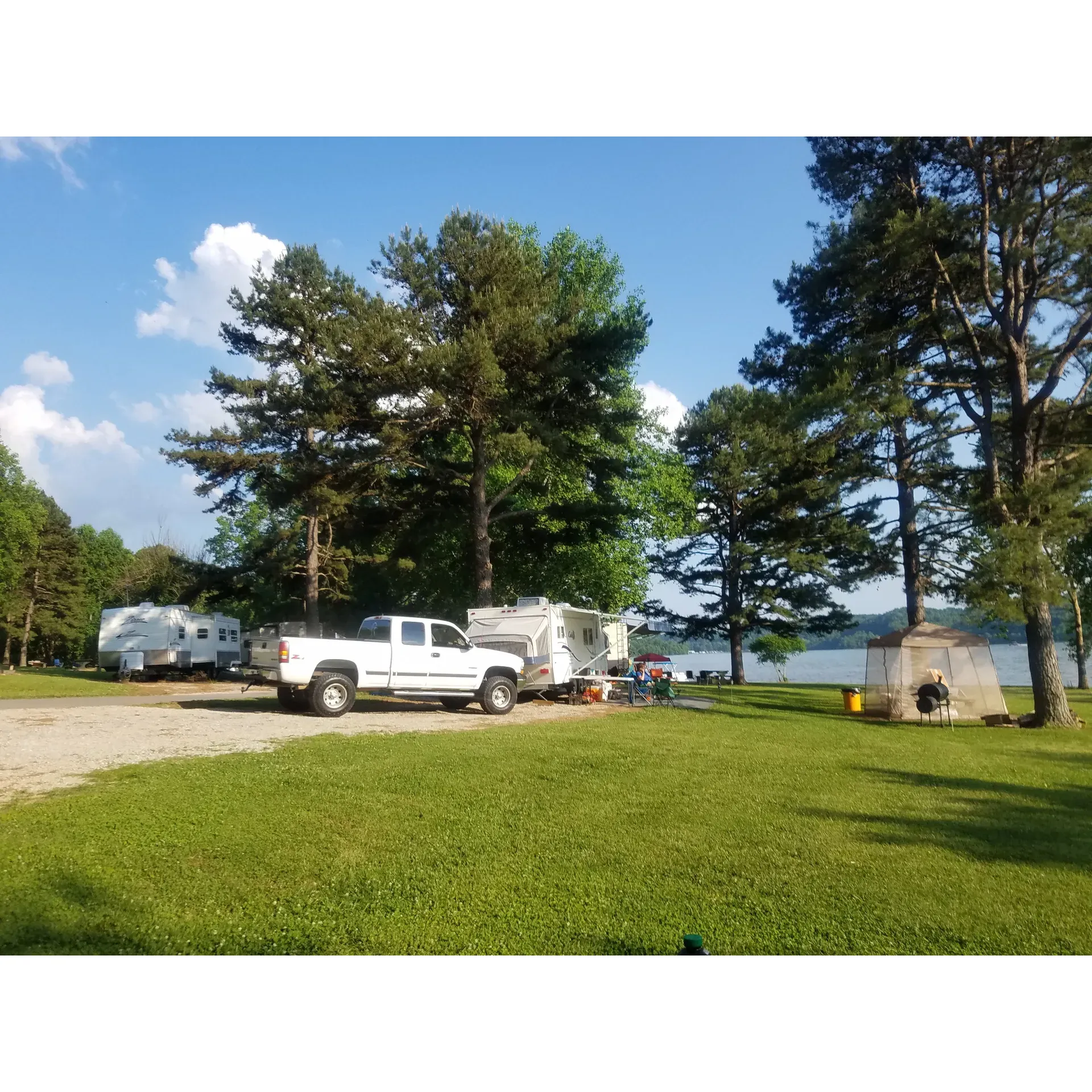 Cedar Point Campground offers a slice of outdoor paradise, providing visitors with a serene escape into the wonders of nature. Boasting meticulously maintained grounds, this scenic campground is a popular choice for both tent and RV enthusiasts who appreciate immaculate facilities and welcoming surroundings. The staff at Cedar Point Campground receive high praise for their friendly service, ensuring that every guest’s stay is comfortable and enjoyable.

Set against the backdrop of picturesque Normandy Lake in Tennessee, Cedar Point Campground invites nature lovers to unwind in one of its peaceful, well-kept campsites. With a range of sites offering breathtaking lakefront views, campers are treated to a tranquil setting where they can reconnect with nature. Each site is equipped with convenient water and electrical hookups, and a handy dump station is available on site for RV campers' needs.

Visitors to the campground can take advantage of a variety of outdoor activities. The beach area is perfect for a refreshing swim, cordoned off for safety and family-friendly fun. Day visitors can make use of ample picnic tables and grills scattered across a thoughtfully arranged day-use area, ideal for family gatherings or a leisurely afternoon in the great outdoors. Bathrooms and showers are accessible to ensure guests' comfort during their stay.

For those planning group events, Cedar Point Campground offers a rentable group shelter, perfect for larger gatherings or celebrations amidst the beauty of the lake's surroundings. A check-in station complete with a small store allows guests to conveniently pick up any last-minute necessities without having to leave the allure of the wilderness.

Many who choose Cedar Point Campground as their temporary retreat from the hustle and bustle of life do so repeatedly, drawn back by the campground's beauty and tranquility. It's a space where memories are made, and the peaceful ambiance provides a perfect canvas for camping enthusiasts to enjoy the great outdoors in all its splendor. Whether it's enjoying a morning coffee with a lakeside view or winding down the day under a canopy of stars, Cedar Point Campground is a cherished destination for many. Description by ChatGPT.