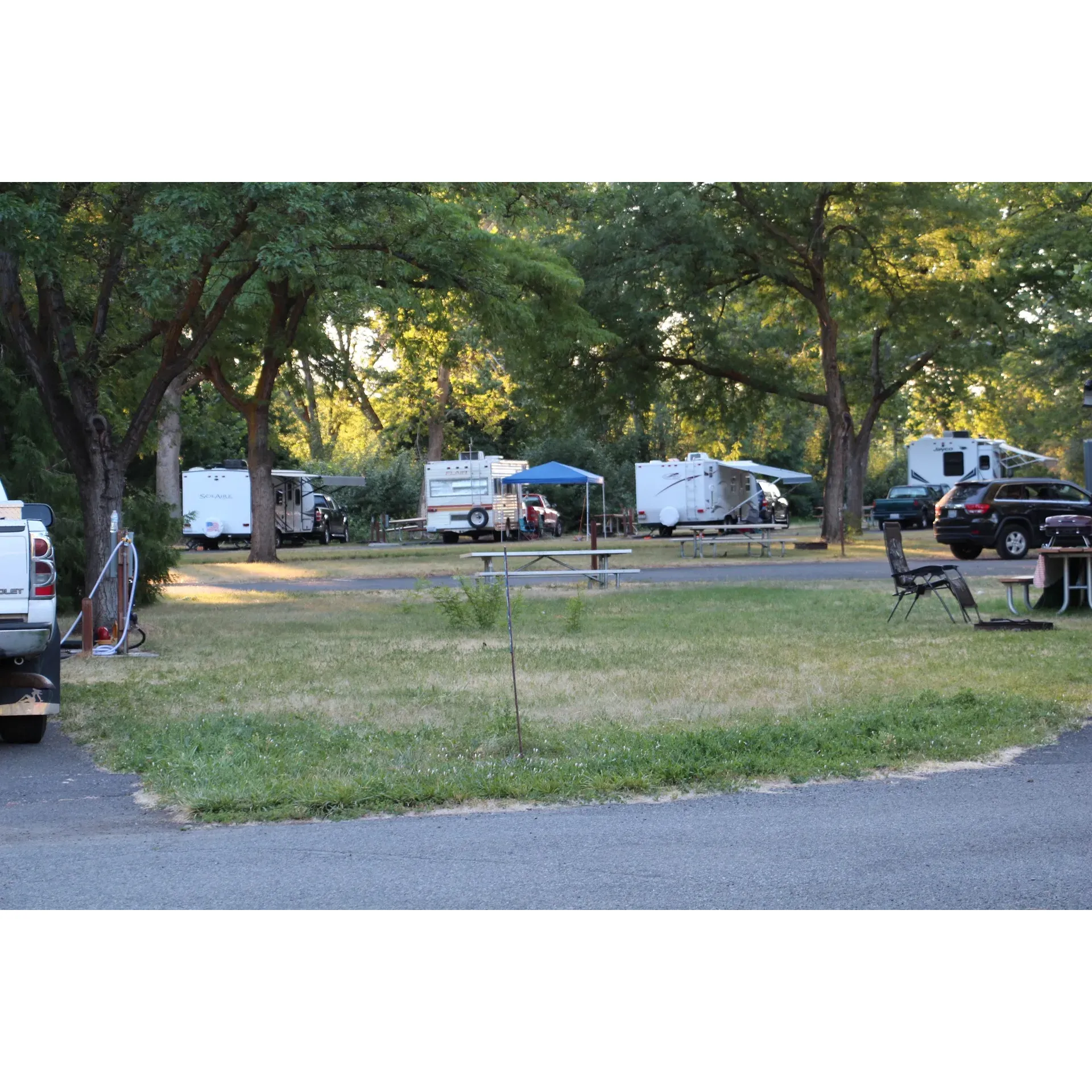 Yakima Sportsman State Park offers its visitors a serene respite with its lush green spaces and abundant outdoor activities. Embrace the great outdoors in a park featuring a harmonious blend of wildlife and recreational facilities. With clean and well-maintained amenities, including restrooms, guests can enjoy a comfortable day out amidst nature's charm.

Those with a keen interest in ornithology will find delight in the park's diverse bird population, making it an ideal spot for birdwatching enthusiasts. The park's network of trails invites hikers of all levels to explore the natural beauty on offer, with a range of trails suitable for a leisurely walk or a more adventurous trek. For families, the park is equipped with a decent playground that provides ample space for children to run and play, ensuring a fun-filled day for all ages.

The convenient payment station allows for a smooth self-check-in experience, catering to those looking for an easy and quick start to their outdoor adventure. Bikers can revel in the paths provided, though advised to stay vigilant of natural thorny brush along the trails.

The proximity to the river adds another layer of tranquillity as guests can take a short stroll to enjoy the soothing sounds of the flowing water. For those in search of a refreshing swim, the nearby Roza recreation area presents an excellent opportunity for a dip in the waters.

Visitors can also appreciate the park's accessibility, located close to downtown Yakima, which is perfect for those who wish to combine their park visit with some urban exploration. With a friendly campground host to assist guests, the park ensures a welcoming atmosphere for all who visit.

Yakima Sportsman State Park, indeed, provides an enjoyable, low-key camping experience and an opportunity to bask in the simple pleasures of nature, all while being within reach of the city conveniences. It's a place where families and friends can gather, explore, and create lasting memories in the lush landscapes of Washington State. Description by ChatGPT.