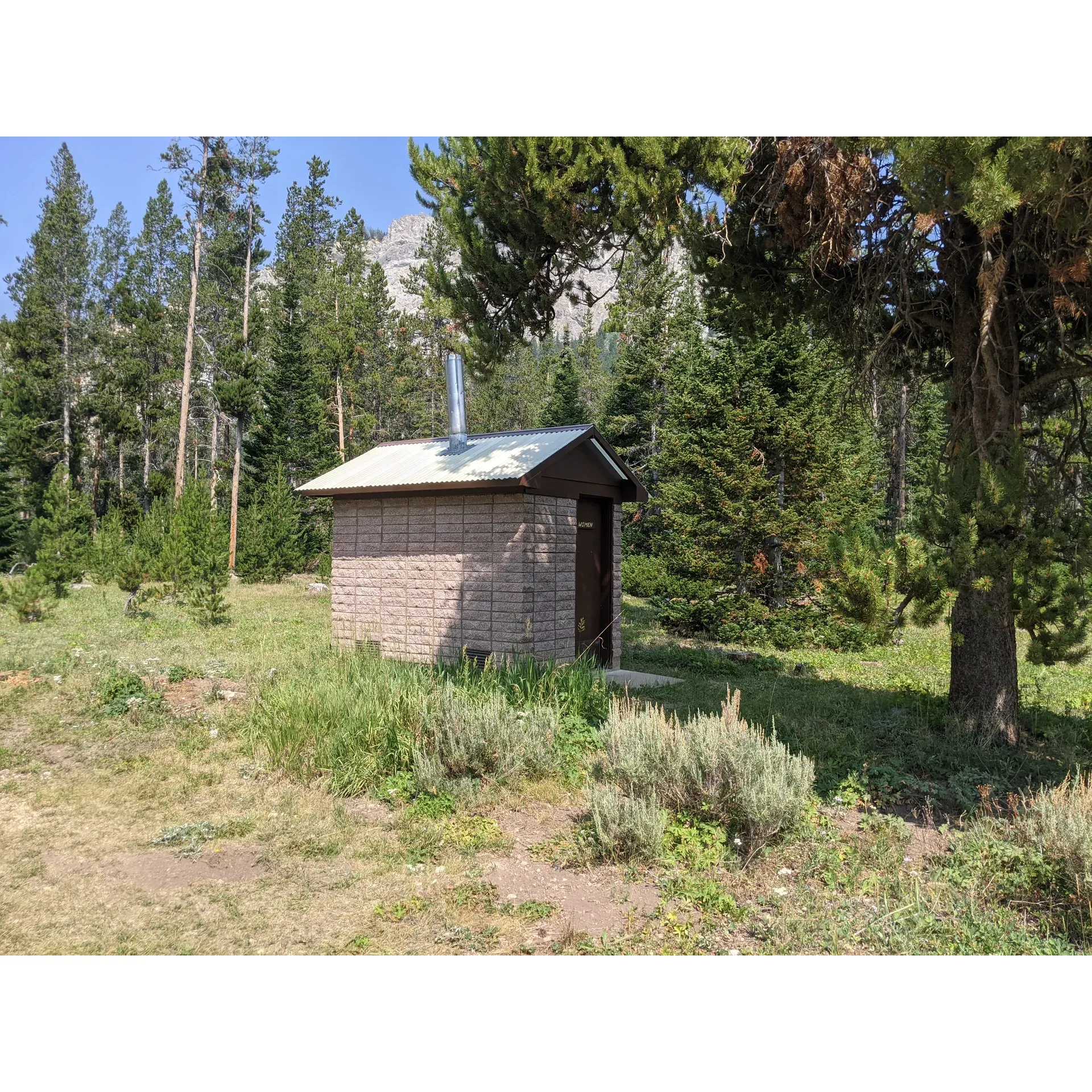 Sacajawea Campground is an idyllic retreat for nature lovers and those seeking an escape into the great outdoors. At an elevation of 8,300 feet, this tranquil campground offers 24 first-come-first-served sites, each equipped with picnic tables, fire rings, and access to vault toilets and trash bins. Due to its emphasis on conservation, the campground also provides bear-proof bins to ensure a harmonious coexistence with the local wildlife.

The campground embraces the spirit of simplicity, with a pricing structure that is both affordable and accessible, charging just $7 per site, or a reduced rate of $3.50 for those eligible. Although there is no reservation system, the ample space and secluded nature of the campground mean you're likely to find a spot to enjoy its serene surroundings.

Guests can appreciate the convenience of water spigots distributed throughout the campground, offering fresh water pending final testing. Sacajawea Campground takes pride in maintaining high environmental standards, mirroring the pristine beauty that surrounds it.

For those looking to unplug and disconnect, the campground is a breath of fresh air, as it is free from the distractions of cellular service across major networks. This disconnect encourages guests to immerse themselves in the peacefulness of the area, indulge in unhurried conversations around the campfire, or simply soak up the tranquil sounds of nature.

The campground is attended by a host who is available on-site, ensuring the grounds are maintained and that guests have a point of contact should they need assistance. Although some sites are modest in size, there are options available to accommodate travel trailers and RVs, providing comfort and convenience to all kinds of travelers.

Approaching the campground involves a scenic drive 23 miles from Big Piney, transitioning from paved roads to well-graded gravel, presenting an enjoyable journey through nature without the roughness of an untamed trail. In proximity to historical and scenic attractions, Sacajawea Campground serves as an excellent base for those wishing to explore Snider Basin and the historic Lander Cutoff of the Oregon Trail.

While the facility once underwent improvements to enhance the guest experience, it has since emerged as a cherished spot for those in search of tranquility, scenic beauty, and an authentic camping experience in the embrace of the wilderness. Whether you’re a solo adventurer, a family, or a group of friends, Sacajawea Campground promises a welcoming and memorable stay amidst the vast splendor of nature. Description by ChatGPT.