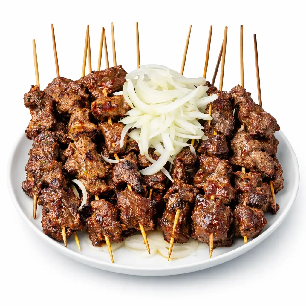 Experience the vibrant flavors of African cuisine with these juicy beef soya skewers. Tender cuts of beef chuck are marinated in spices and cooked to perfection, perfect as a main course or appetizer.