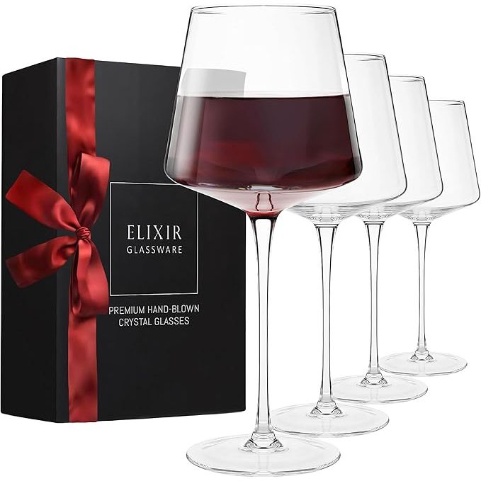 The ELIXIR GLASSWARE Red Wine Glasses Set of 4 features tall, hand-blown crystal wine glasses with a capacity of 22 oz each. These unique, large wine glasses are designed with a long stem for elegant and comfortable handling while sipping on your favorite red wine.