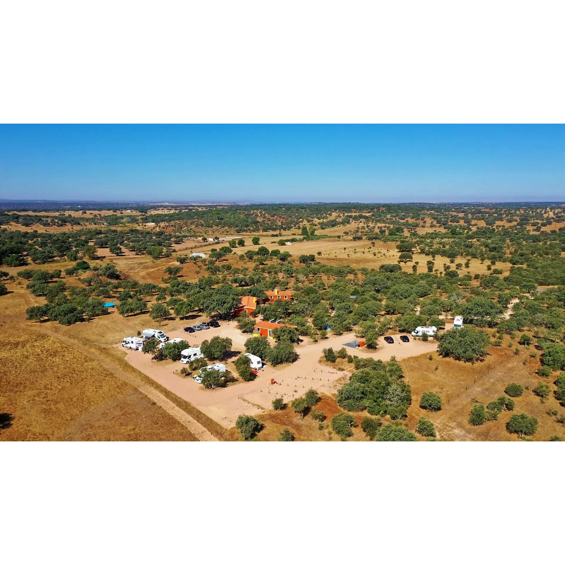 Camping Puro Alentejo is a charming and intimate campsite accommodating a maximum of 35 guests, delightfully positioned to serve as the perfect base from which to explore the enchanting Alentejo region. Renowned for its serene and restful ambiance, it's an ideal retreat for relaxation amidst nature's tranquility.

The dedicated hosts, Paula and Bobby, are praised for their exceptional care and effort to maintain the highest standards of order, providing assistance that goes above and beyond to ensure guests have a seamless experience. Cleanliness is a top priority, with facilities meticulously kept and easily accessible, drawing appreciation from visitors who often highlight the immaculate condition of the campsite.

Guests can enjoy spacious pitches, set against the backdrop of picturesque countryside, offering stunning views and an ambiance conducive to enjoyable walks, especially for those visiting with canine companions. The popular and hospitable on-site cafe bar serves as a heartwarming gathering spot, providing an excellent menu—complete with delightful pizzas and a cozy vibe when the weather cools.

With a reputation as one of the finest campsites in both Portugal and beyond, praised for its impeccable maintenance, Camping Puro Alentejo has won the hearts of many. Its convivial environment extends to interactions with the local community, known for their warm and welcoming nature despite any language barriers.

The on-site restaurant adds to the charm, providing a snug dining experience. The surrounding area, rich in history, invites adventurers to explore the nearby Roman bridge and dolmen, enhancing the sense of discovery. Guests eagerly anticipate their return, confirming the campsite's status as a precious jewel for those seeking a peaceful getaway, distinguished service, and a memorable stay in the beautiful Alentejo region. Description by ChatGPT.