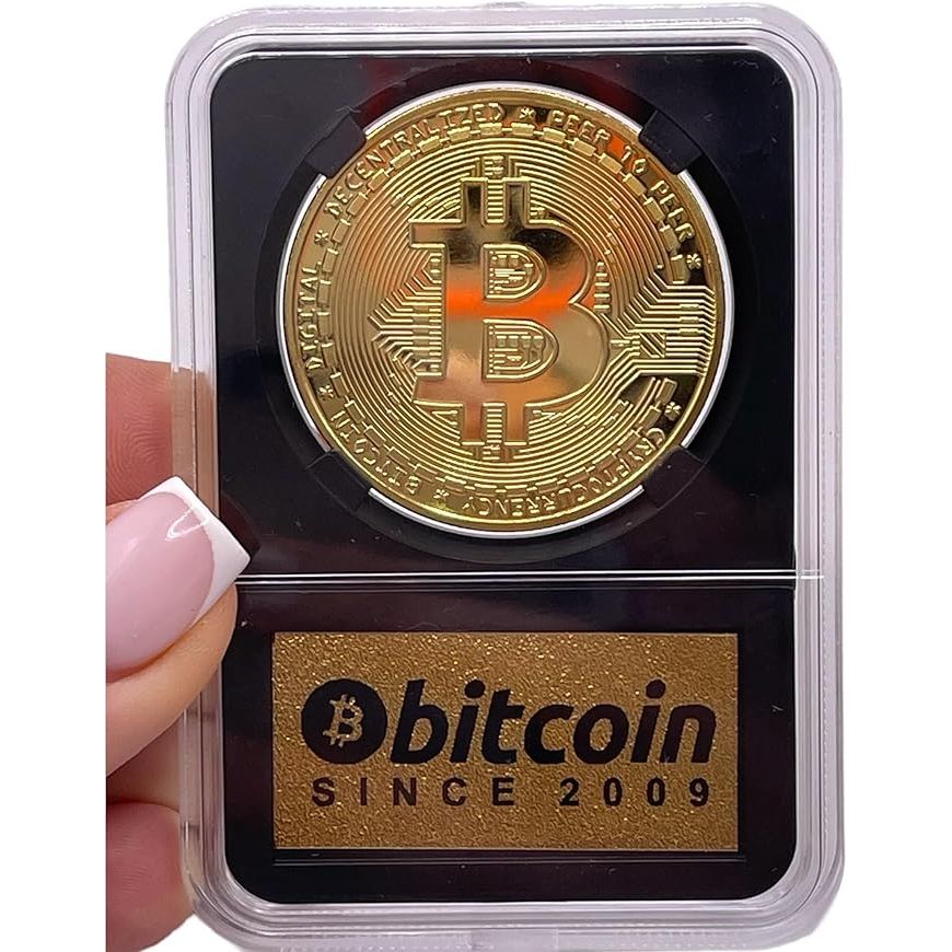 The Bitcoin Coin in Collector's Edition Case is a limited edition physical gold coin designed for fans of cryptocurrency. The coin comes in a display case, making it an ideal birthday gift or decoration for a home office. Each coin is individually numbered and highly sought after by collectors.