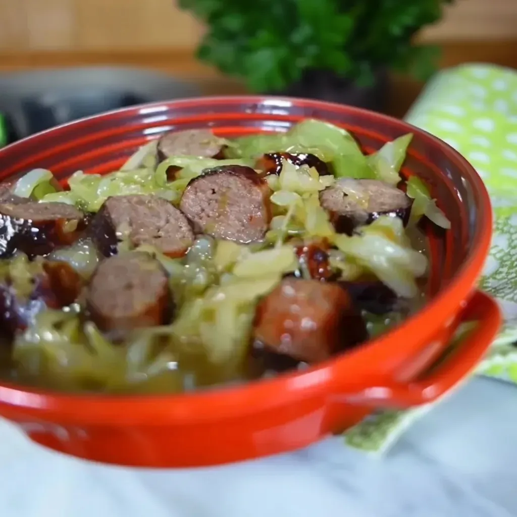 Beer-Braised Bratwurst with Sautéed Cabbage image