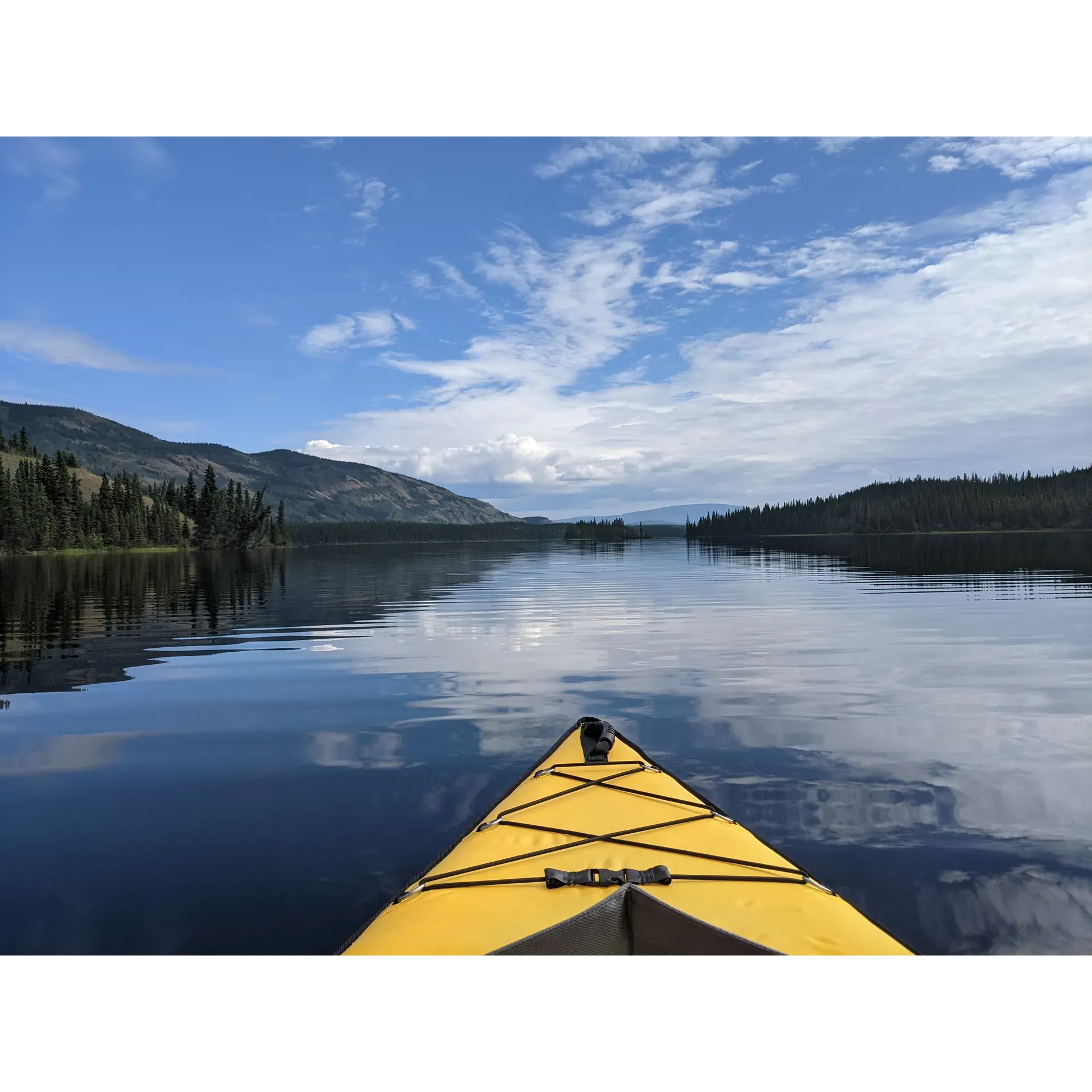 Tatchun Lake is a remote and pristine body of water located in the northern part of the Yukon Territory in Canada. The lake is situated near the community of Ross River and is surrounded by rugged wilderness, making it a popular destination for outdoor enthusiasts seeking a secluded and tranquil retreat. The lake is fed by several small streams and is home to a variety of fish species, making it a popular spot for fishing.

Tatchun Lake is also a great place for wildlife viewing, with opportunities to spot moose, beavers, and various bird species in the area. The lake is accessible by a rough gravel road and offers camping and boating opportunities for visitors looking to immerse themselves in the natural beauty of the Yukon. Whether you enjoy fishing, hiking, bird watching, or simply relaxing in a peaceful setting, Tatchun Lake is a hidden gem waiting to be explored. Description by ChatGPT.