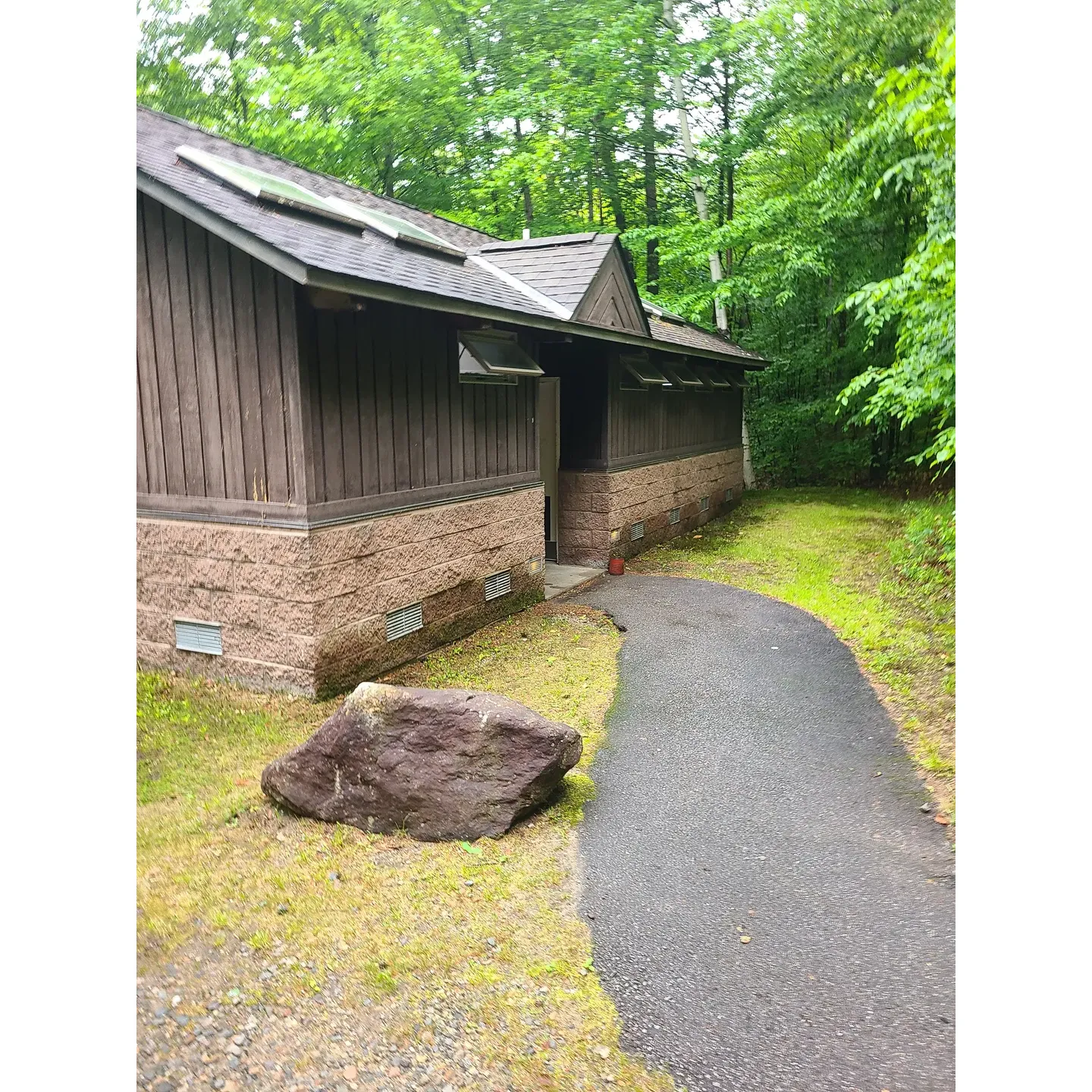 Russell Pond Campground emerges as a serene sanctuary for outdoor aficionados, cradled in the majestic ambience of New Hampshire's White Mountains. Revel in the tranquility that over 1600 feet elevation provides, where the symphony of nature envelops you. The campground offers an authentic wilderness escape complete with modern conveniences like flush toilets and hot shower facilities, complemented by the warmth of friendly campsite hosts.

Visitors will find solace in spacious, well-maintained campsites, each equipped with a fire ring and picnic table, perfect for a family meal or a cozy evening under the stars. Marvel at the breathtaking mountaintop views that become particularly vivid in the spring and fall, with ample hiking trails and outdoor activities to satisfy any adventurer's cravings.

The pristine Alpine Pond adds a touch of picturesque beauty to the campground, enhancing the already splendid natural landscape. With the vibrant towns of Lincoln and Woodloop a mere stone's throw away, guests can immerse themselves in local charm while staying within an easy distance of a peaceful retreat.

For those bringing their canine companions, there's a special nook near the boat launch where pets can frolic in the shallow waters. And while the campground respects its forest inhabitants by discouraging beachhead access for dogs, it maintains an immaculate setting for all guests.

The terraced layout promising privacy, coupled with the convenience of potable water access, ensures that comfort is never compromised. The campground's diligent provision of dry firewood and firestarters means you're always prepared for a spontaneous bonfire amidst the tranquility of the towering trees.

Guests are encouraged to be mindful stewards of nature, keeping food secured to not attract wildlife, and maintaining the campground's integrity by using designated areas for water disposal. With each visit, outdoor enthusiasts are sure to find Russell Pond Campground a jewel within the White Mountains—a place where memories are made, and the heart finds a home in the embrace of unspoiled nature. Description by ChatGPT.