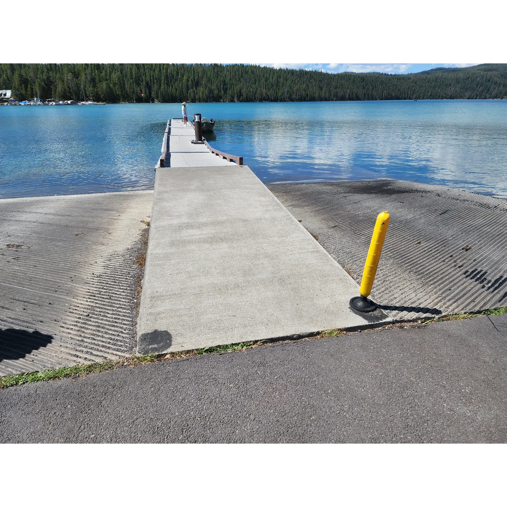 Paulina Lake Campground is a beloved outdoor retreat enjoyed by many avid campers over the years, including those who have returned season after season to soak in its beauty and serenity. The campground is overseen by dedicated hosts who strive to ensure guests have a memorable experience amidst the stunning natural surroundings.

Embraced by lush forest scenery with the shimmering Paulina Lake as its centerpiece, the campground offers exceptional views that leave visitors in awe. The lake itself invites tranquility and provides a picturesque backdrop for all kinds of lake activities. Here, campers can indulge in excellent fishing, casting their lines in hopes of a good catch, or simply spend time on gentle waters that reflect the clear blue skies.

Outdoor enthusiasts will find ample opportunities to explore the wonders of nature, with well-maintained hiking trails winding around the lake. These pathways open up to even more breathtaking vistas, making for delightful day hikes and wildlife spotting. Adventurous souls can seek out warmer experiences by venturing to nearby hot springs, despite being somewhat elusive to locate.

The campsites are pristinely kept, with cleanliness being a top priority. Although the sites are situated close together, fostering a sense of camaraderie among campers, there's still a prevailing respect for personal space and the quiet enjoyment of nature. Generators can subtly hum in the background, but their presence does not diminish the tranquility of the starlit nights.

Adjacent to the campground, a day-use area provides the perfect launch point for boating, ensuring that every day can be filled with water-bound adventures or peaceful relaxation on the lake's glassy surface. Campers come prepared with sunblock and insect repellent to make the most of their time outdoors, undisturbed by the elements.

Paulina Lake Campground captures the heart of the ideal camping experience, with clean facilities, friendly faces, and an environment that simply radiates natural charm. It's a place where you can reconnect with nature and leave with stories and memories of a fantastic outdoor adventure. Description by ChatGPT.