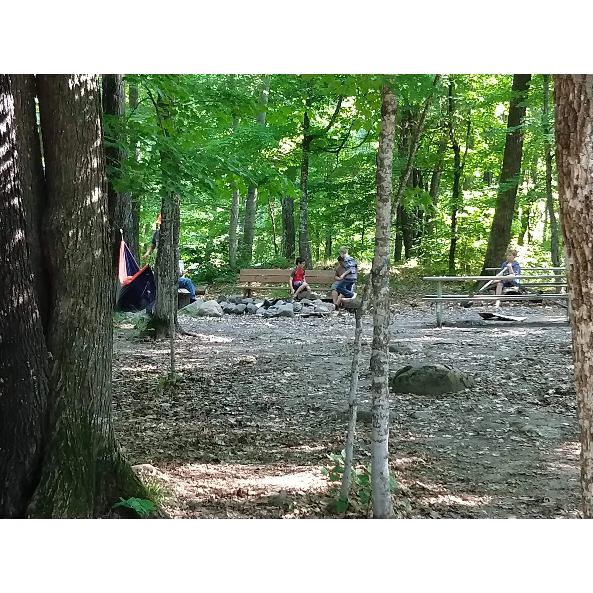 Quapaw Campsite emerges as an exemplary choice for campers seeking a blend of convenience and outdoor experience. Situated as the closest campsite to the vibrant Trading Post, guests can indulge in the ease of access to a myriad of supplies, treats, and camping essentials without the hassle of a lengthy trek. Additionally, the renown parade field sits only a stone's throw away, placing visitors at the heart of excitement and community events.

Adventurers and families alike rave about Quapaw's prime location, which significantly reduces the travel time to key attractions and facilities, allowing for more leisure and less commuting. The proximity to central areas is a boon for those who appreciate the comfort of nearby amenities while still being able to retreat into a serene, natural setting.

The campsite itself is praised for being well-maintained and offering a great outdoor experience. It is an ideal spot for those who want to wake up surrounded by nature's beauty and yet stay connected to the lively pulse of campsite activities. With its combination of accessibility, natural charm, and a welcoming ambiance, Quapack Campsite stands out as a premium choice for anyone planning a memorable and convenient camping excursion. Description by ChatGPT.