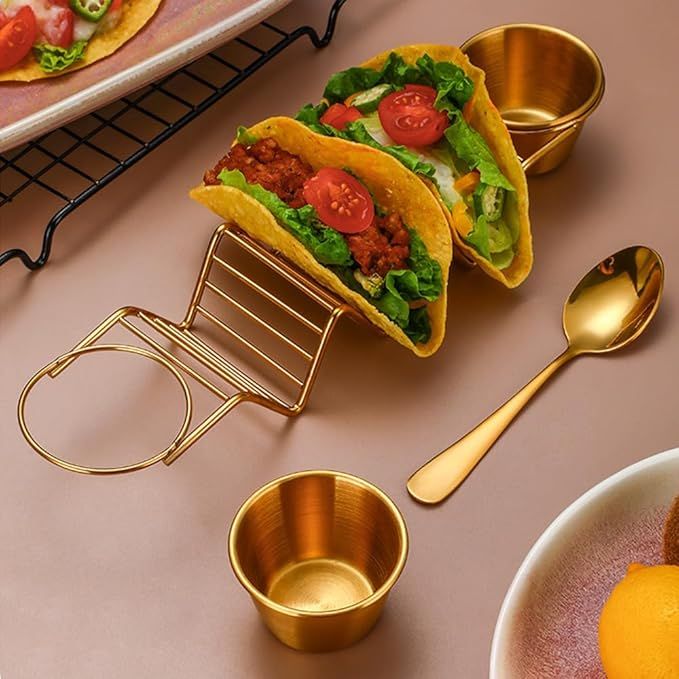 The Taco Holder Stand is a convenient and durable way to serve tacos without the mess. Made of high-quality stainless steel, this taco rack is oven safe for baking, dishwasher safe for easy cleanup, and grill safe for outdoor cooking.