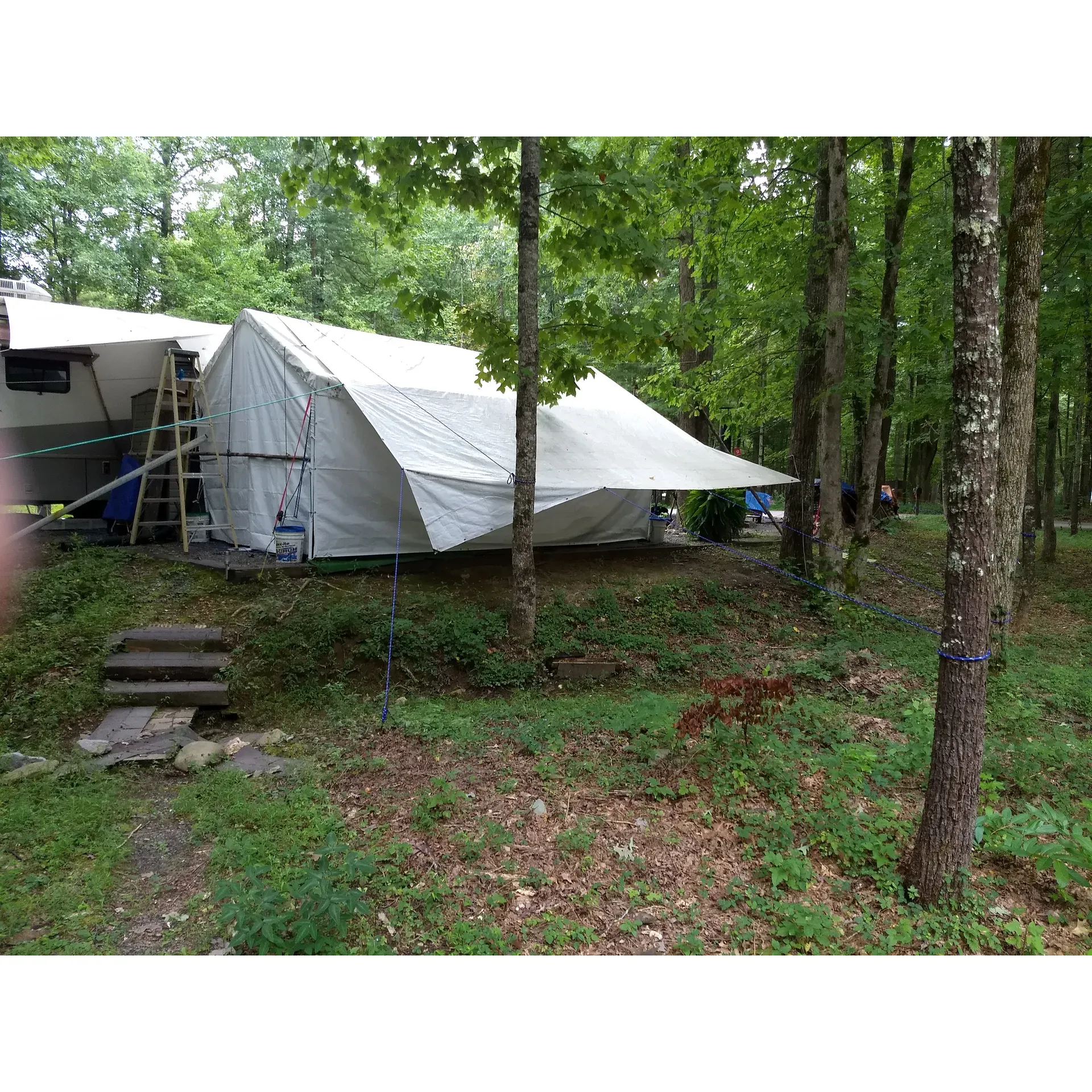 Indian Boundary Campground is a slice of outdoor paradise that beckons families, nature enthusiasts, and adventure-seekers alike. Visitors rave about the delightful experience, often finding the scenic allure and the hospitality provided to be beyond a mere five-star rating. A recent stay in loop C has guests commending the campground hosts for their warm, informative, and vigilant service, ensuring a comfortable stay for all.

The spacious lots at Indian Boundary Campress with their thoughtful amenities. Guests can enjoy a sizeable picnic table, a fire pit with a cooking grate for those delightful smores under the stars, and a utility pole perfectly designed for hanging lights, contributing to a cozy, homelike atmosphere in the great outdoors. The loop and trails are kid-friendly, with ample space for bike and scooter rides.

The campground is set near the serene Indian Boundary Lake, whose sandy beach area is a hit among families. The water is praised for its cleanliness and manageable depth, making for an ideal swimming experience—even for those who haven't dipped their toes in lake waters for over a decade! While the beach is a popular spot, visitors suggest arriving early to secure the perfect place to soak up the sun and relax.

Indian Boundary Campground also offers a variety of recreational activities. Whether visitors are looking to fish, engage in water sports like paddle boarding and kayaking, or explore the surrounding trails by hiking or biking, there is never a shortage of activities. For those looking to unwind, a game of volleyball or simply floating on the lake can be the perfect escape.

The on-site general store is applauded for its friendly owners and the impressive array of necessities and treats it offers, including the nostalgic favorite: ice cream sandwiches. As for the hosts, David and Faye Thompson, they've received high praise for going above and beyond, embodying the essence of stellar customer service.

Guests embarking on this camping adventure should look forward to a digital detox, as cell service gracefully bows out before arrival, leaving room for uninterrupted family time and nature immersion.

As for the reservation process, while the new system may have mixed reviews, the overall consensus is clear: Indian Boundary Campground remains one of the crown jewels of Tennessee's outdoor retreats, rich with memories-in-the-making for returning families and first-timers alike. Whether it's for a peaceful test run or a full camping experience, this campground is the place where great adventures and lifelong memories converge. Description by ChatGPT.