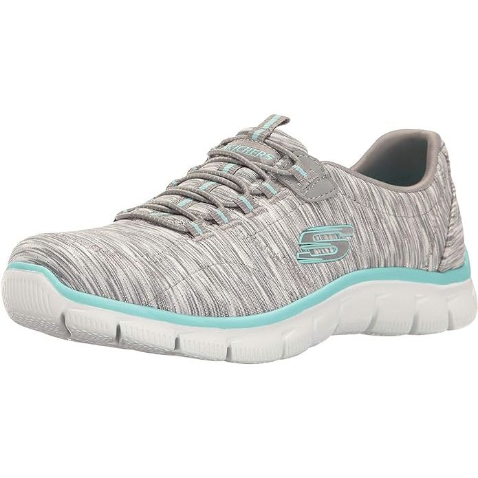 The Skechers Sport Women's Empire Rock Around Fashion Sneaker is a stylish and comfortable shoe designed for active women. The sneaker features a slip-on design with a bungee lacing system for a secure fit without the hassle of tying traditional laces.